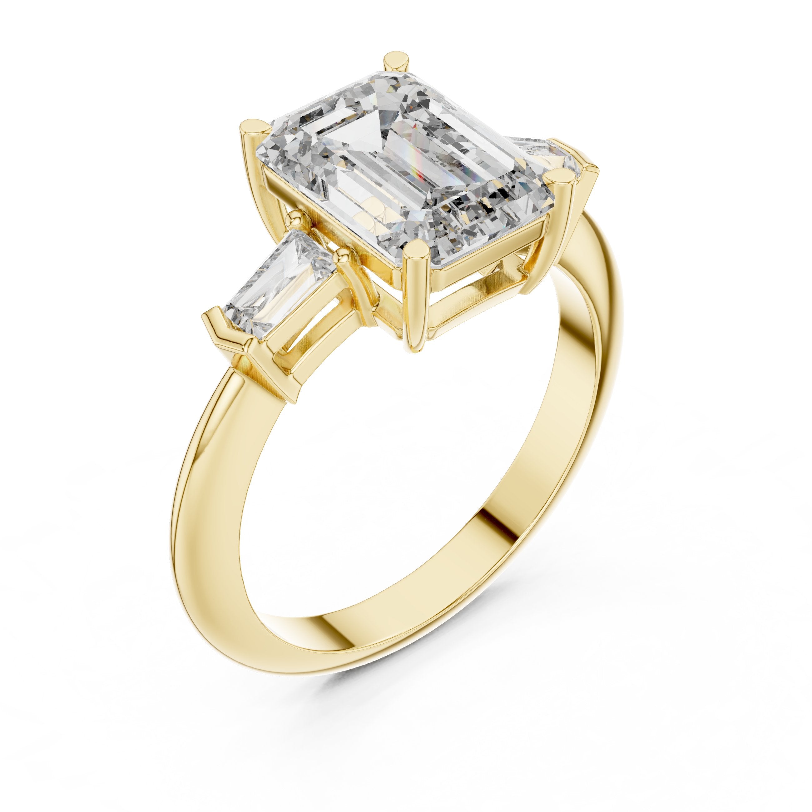 Emerald Cut Three Stone Engagement Ring with Tapered Baguette Sides in Yellow Gold - VYKA Diamonds