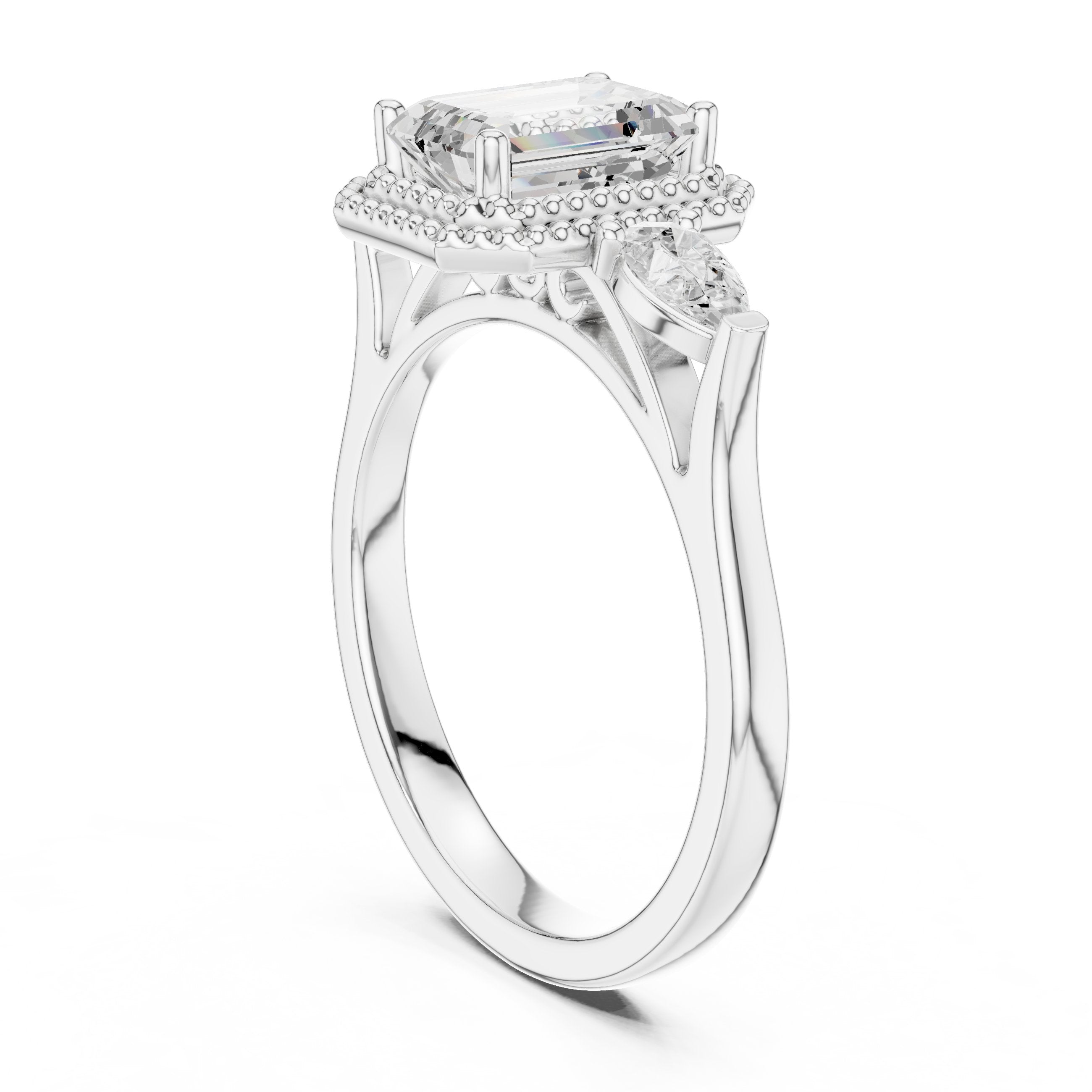 Emerald Cut Three Stone Halo Engagement Ring with Pear Sides in White Gold - VYKA Diamonds