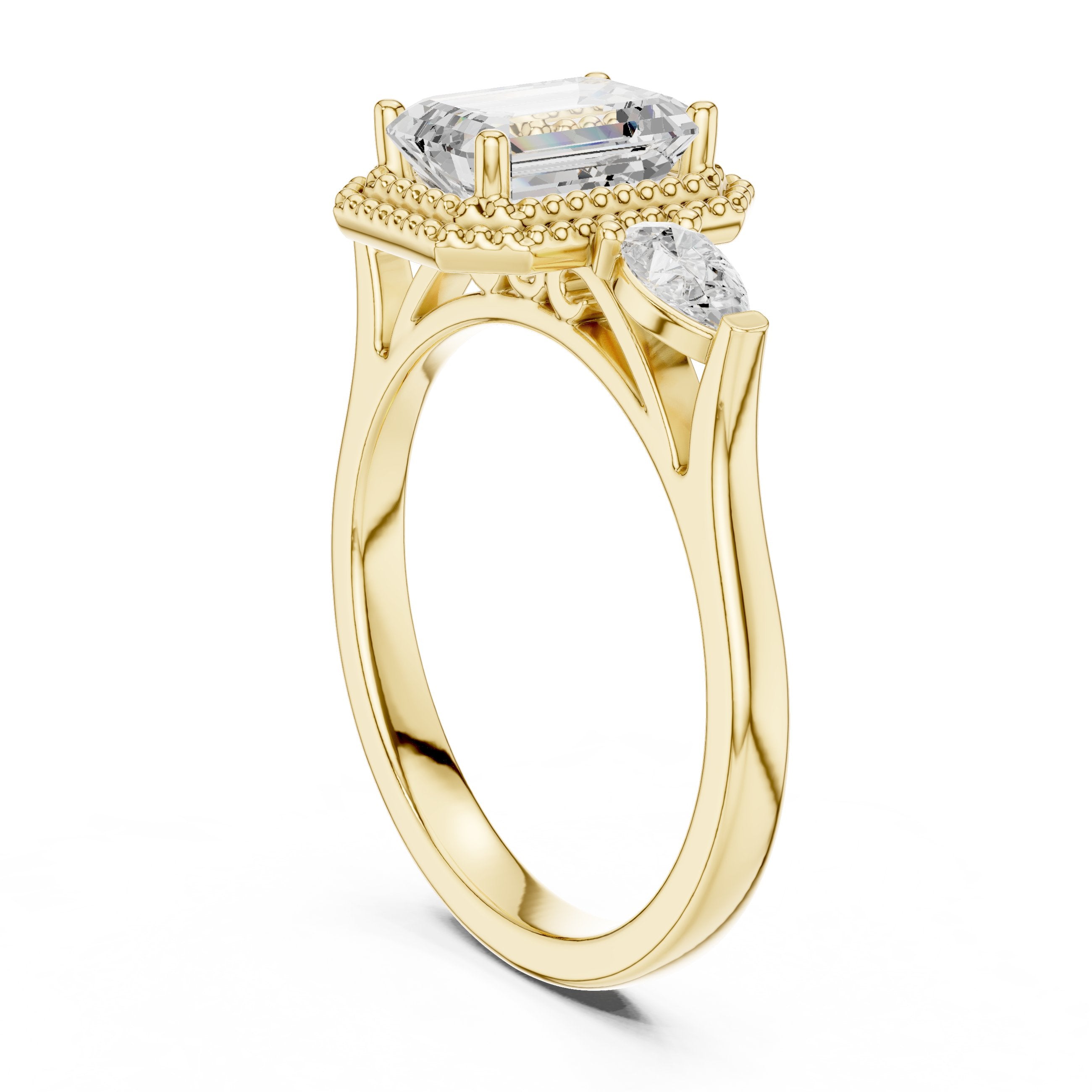 Emerald Cut Three Stone Halo Engagement Ring with Pear Sides in Yellow Gold - VYKA Diamonds