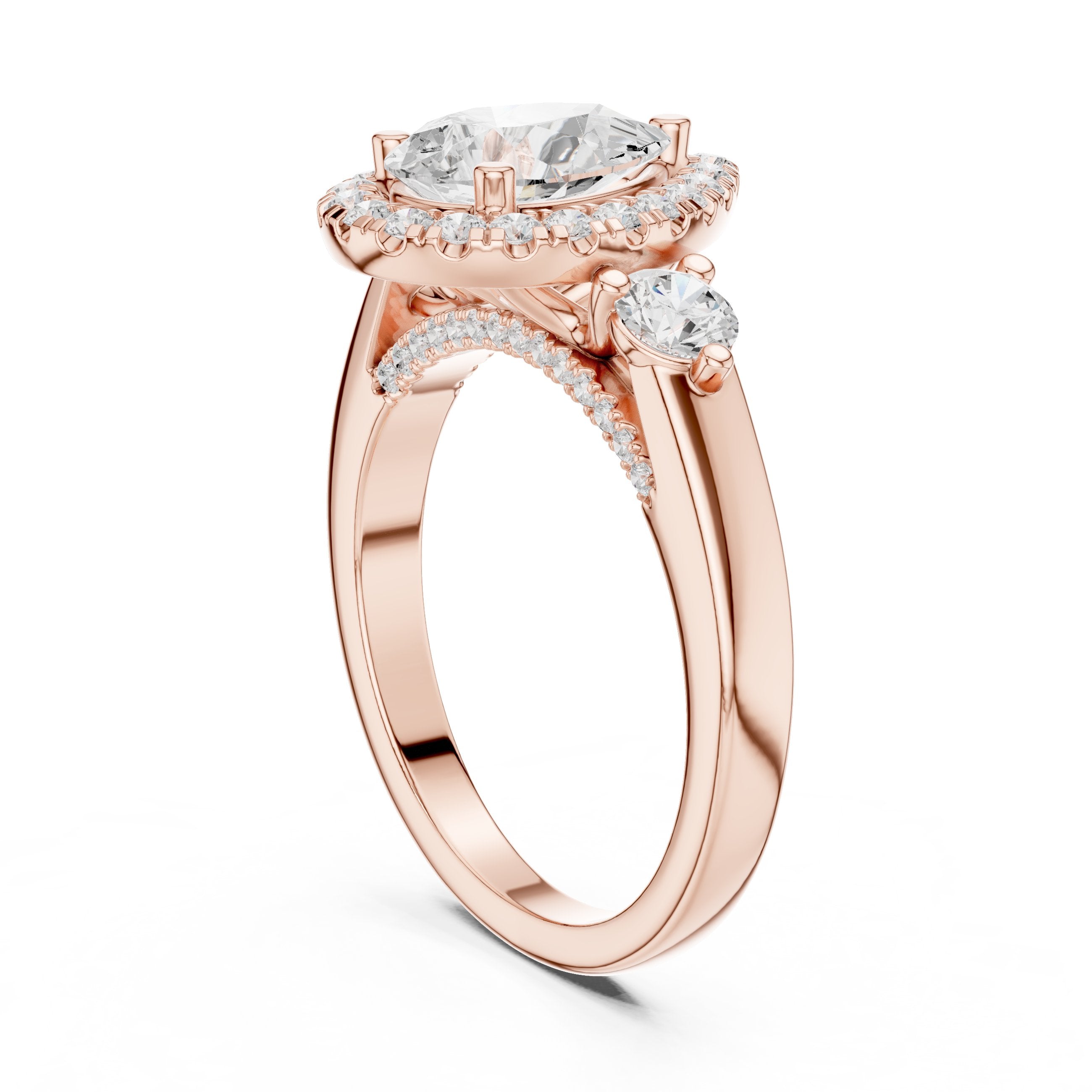 Pear Diamond Three Stone Halo Engagement Ring with Round Side Stones in Rose Gold - VYKA Diamonds