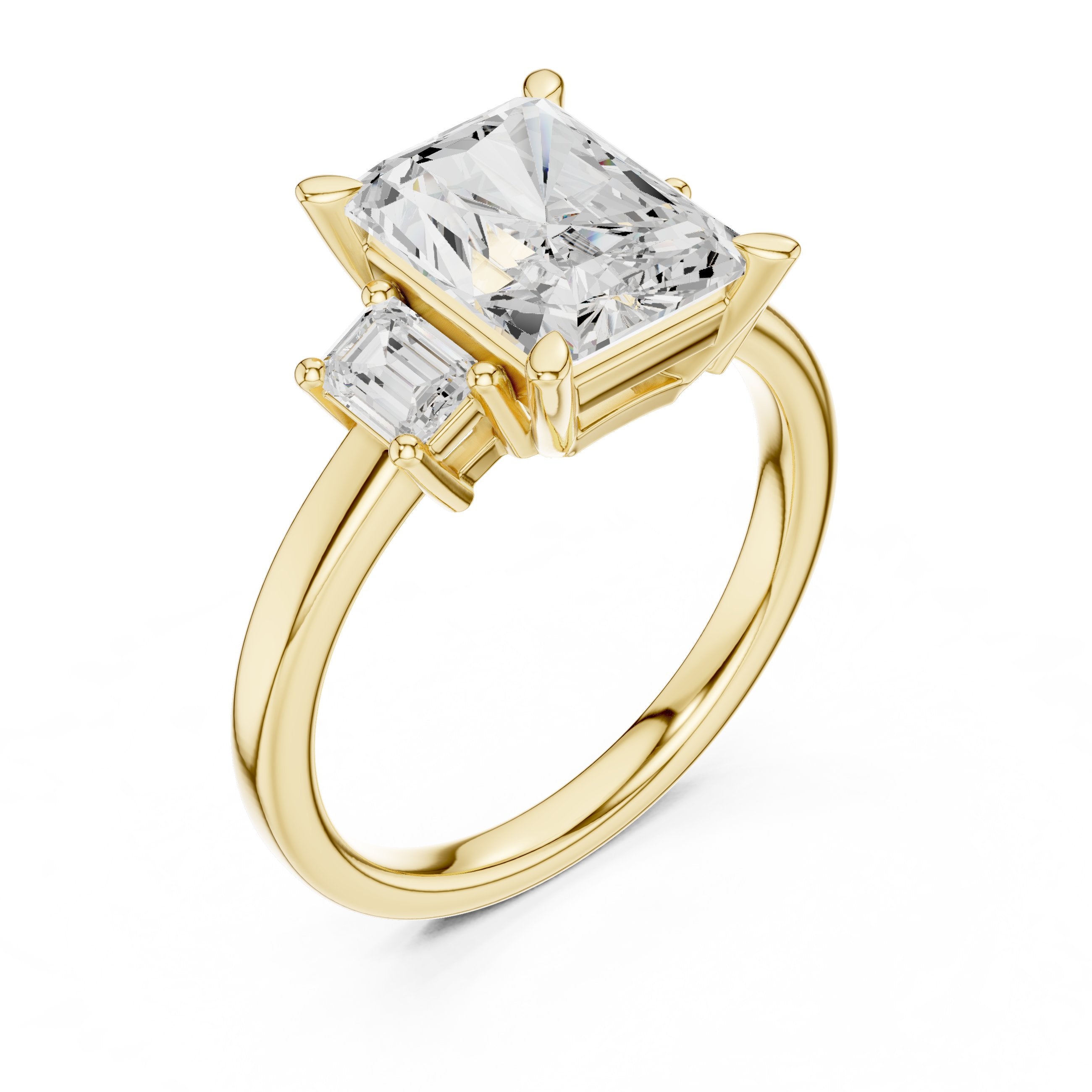 Radiant Cut Three Stone Engagement Ring with Emerald Cut Sides in Yellow Gold - VYKA Diamonds