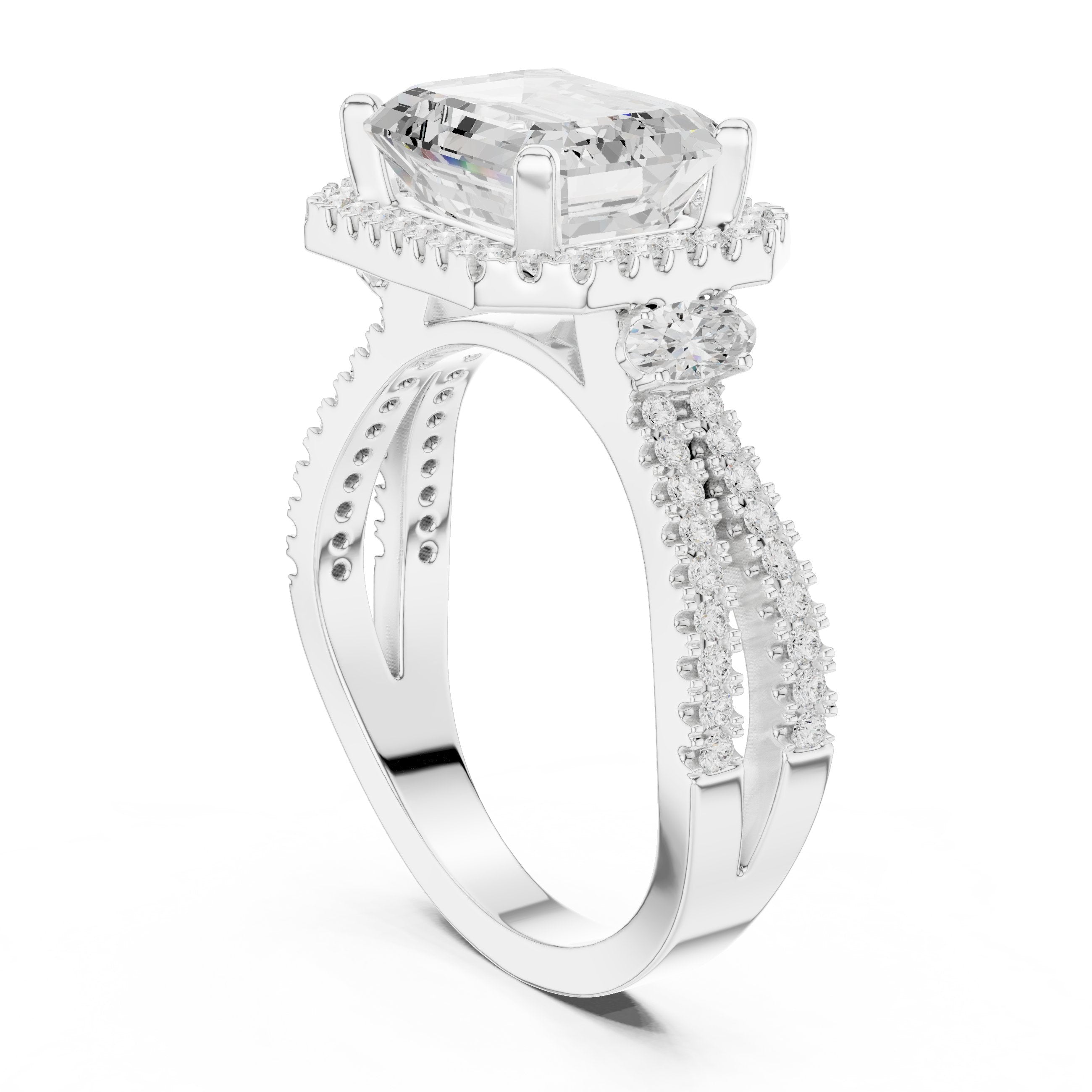 Emerald Cut Three Stone Halo Engagement Ring with Oval Sides and Split Shank Pavé Band in White Gold - VYKA Diamonds