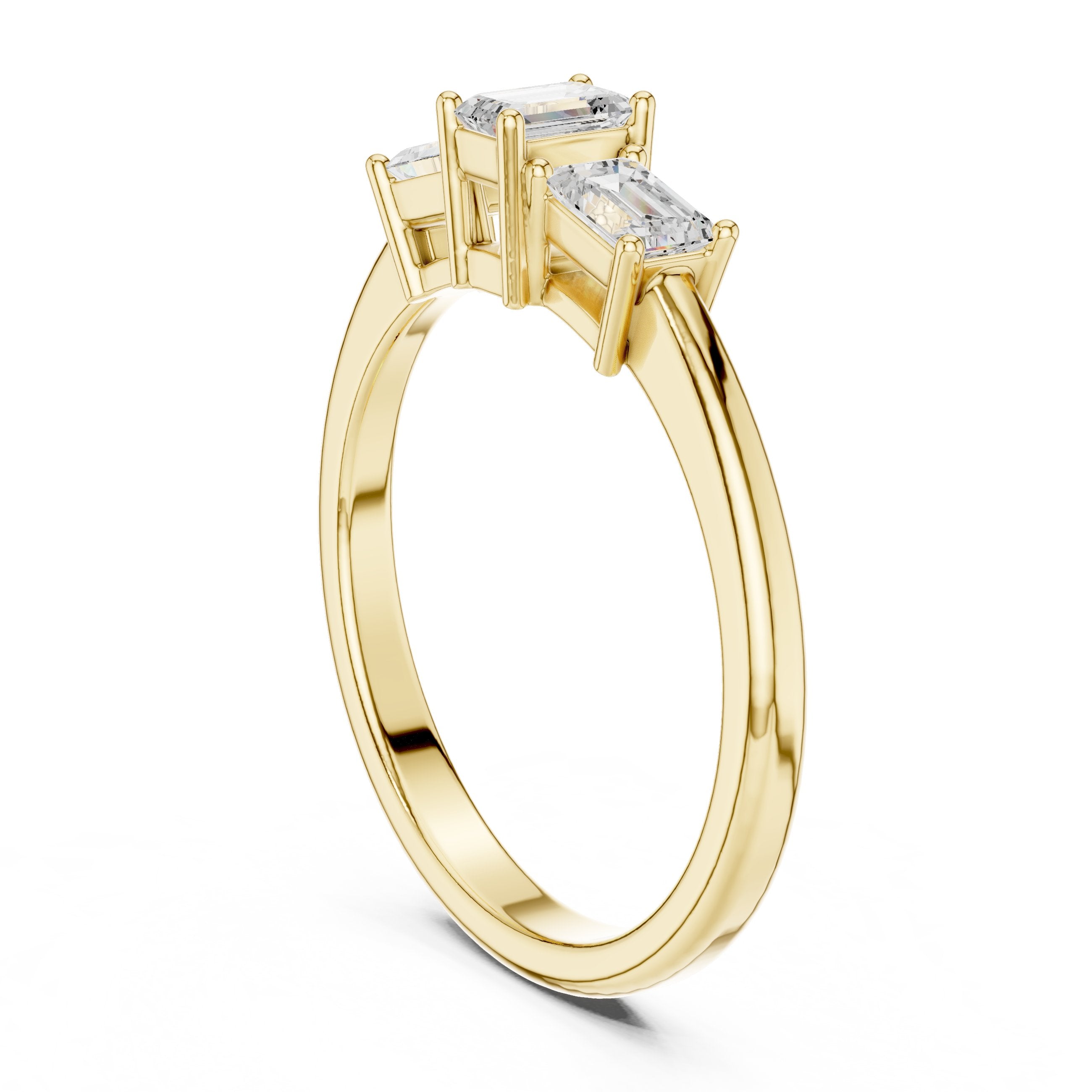Emerald Cut Three Stone Engagement Ring in Yellow Gold - VYKA Diamonds