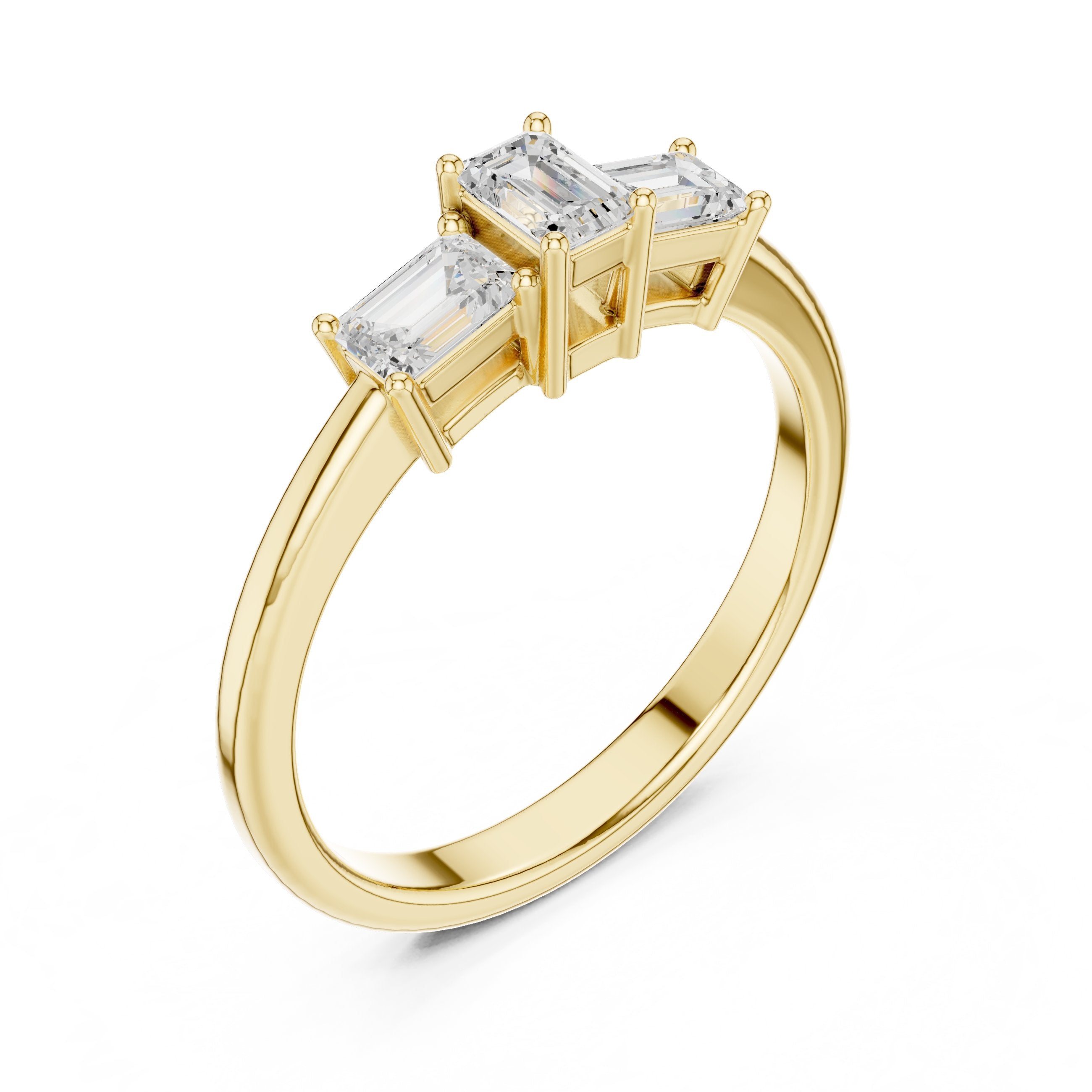 Emerald Cut Three Stone Engagement Ring in Yellow Gold - VYKA Diamonds