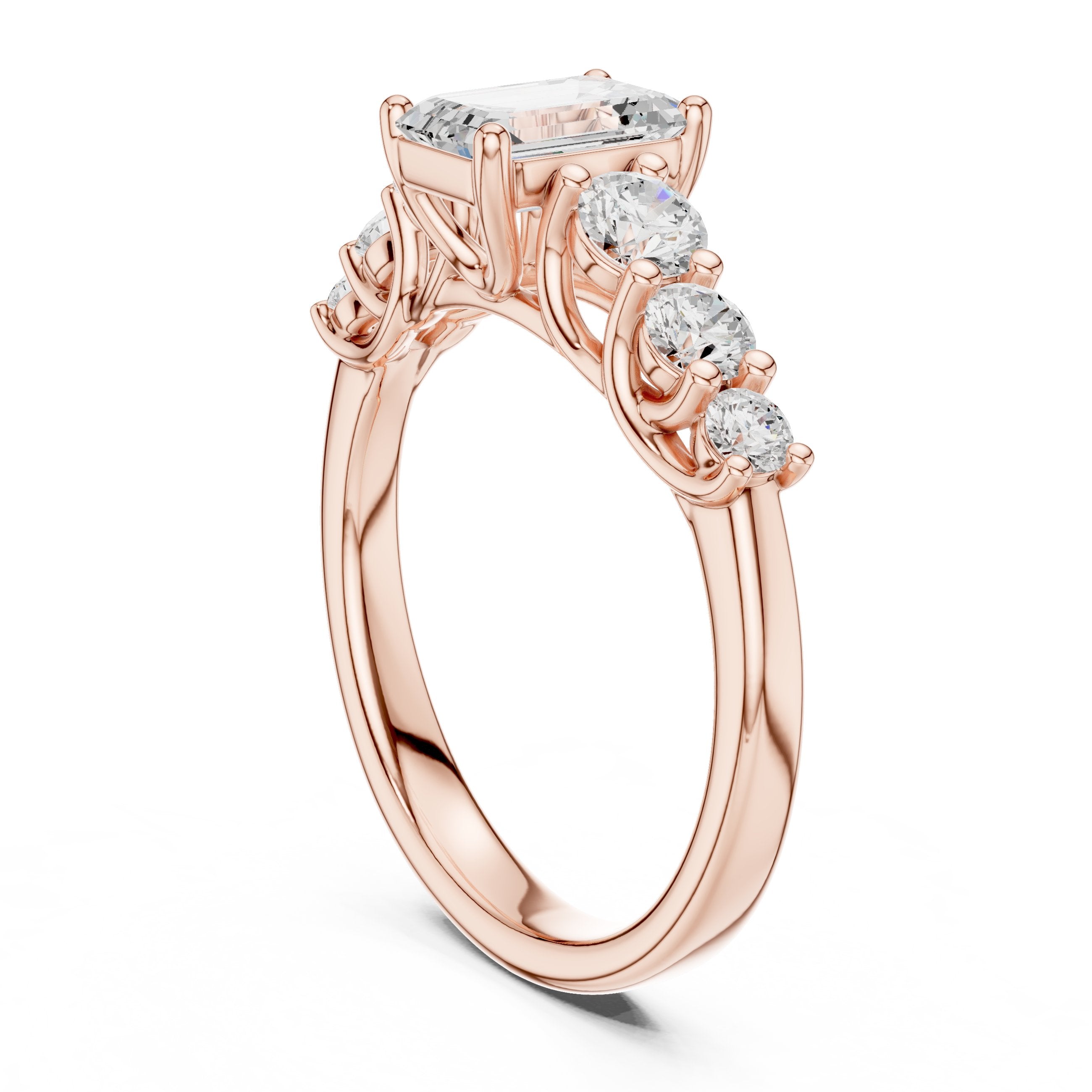 Emerald Cut Engagement Ring with Round Side Accents on Chevron Shoulders in Rose Gold - VYKA Diamonds