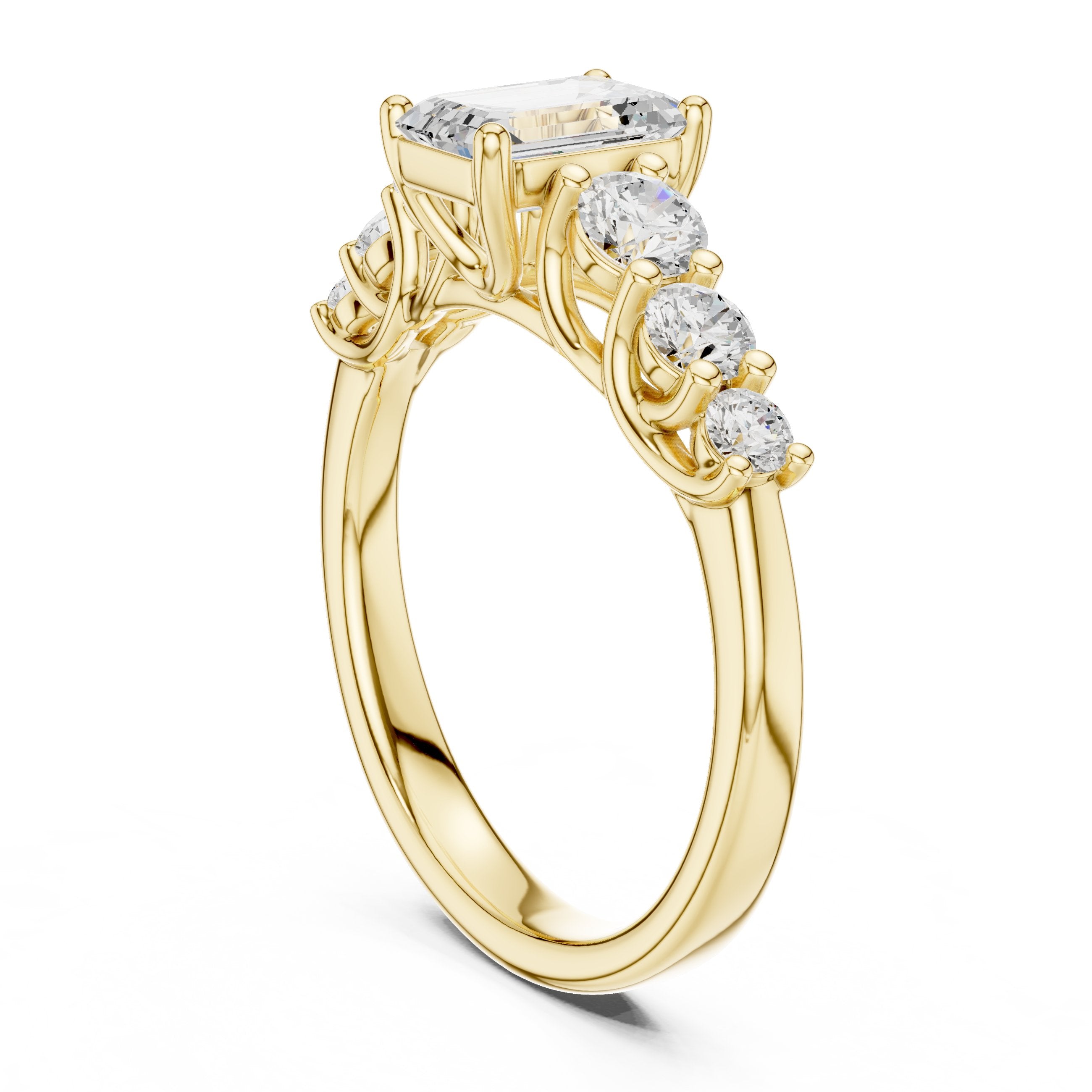Emerald Cut Engagement Ring with Round Side Accents on Chevron Shoulders in Yellow Gold - VYKA Diamonds