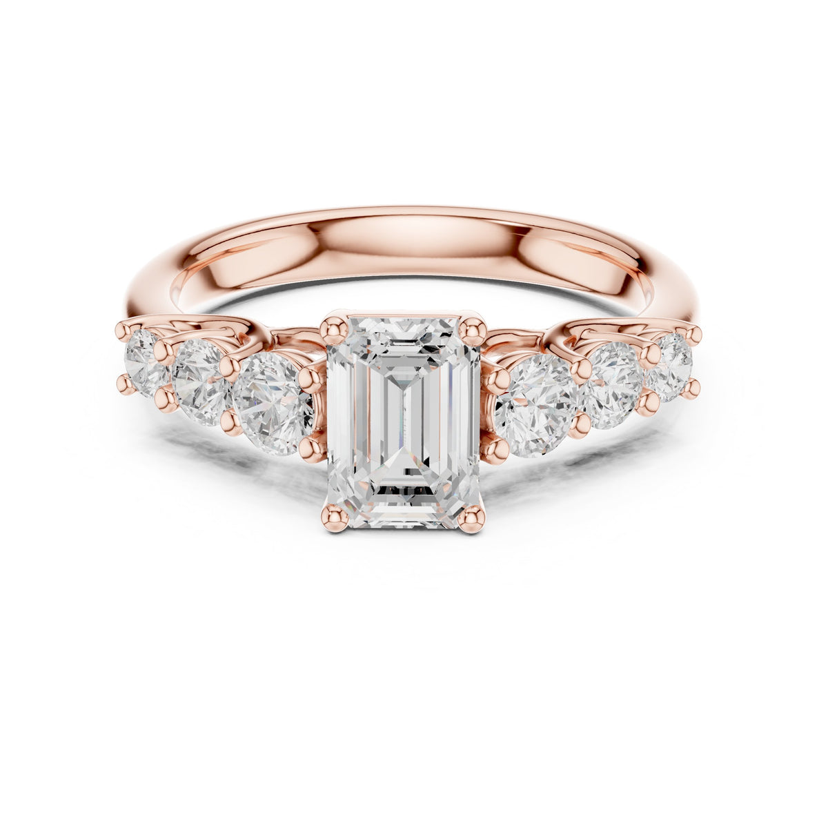 Emerald Cut Engagement Ring with Round Side Accents on Chevron Shoulders
