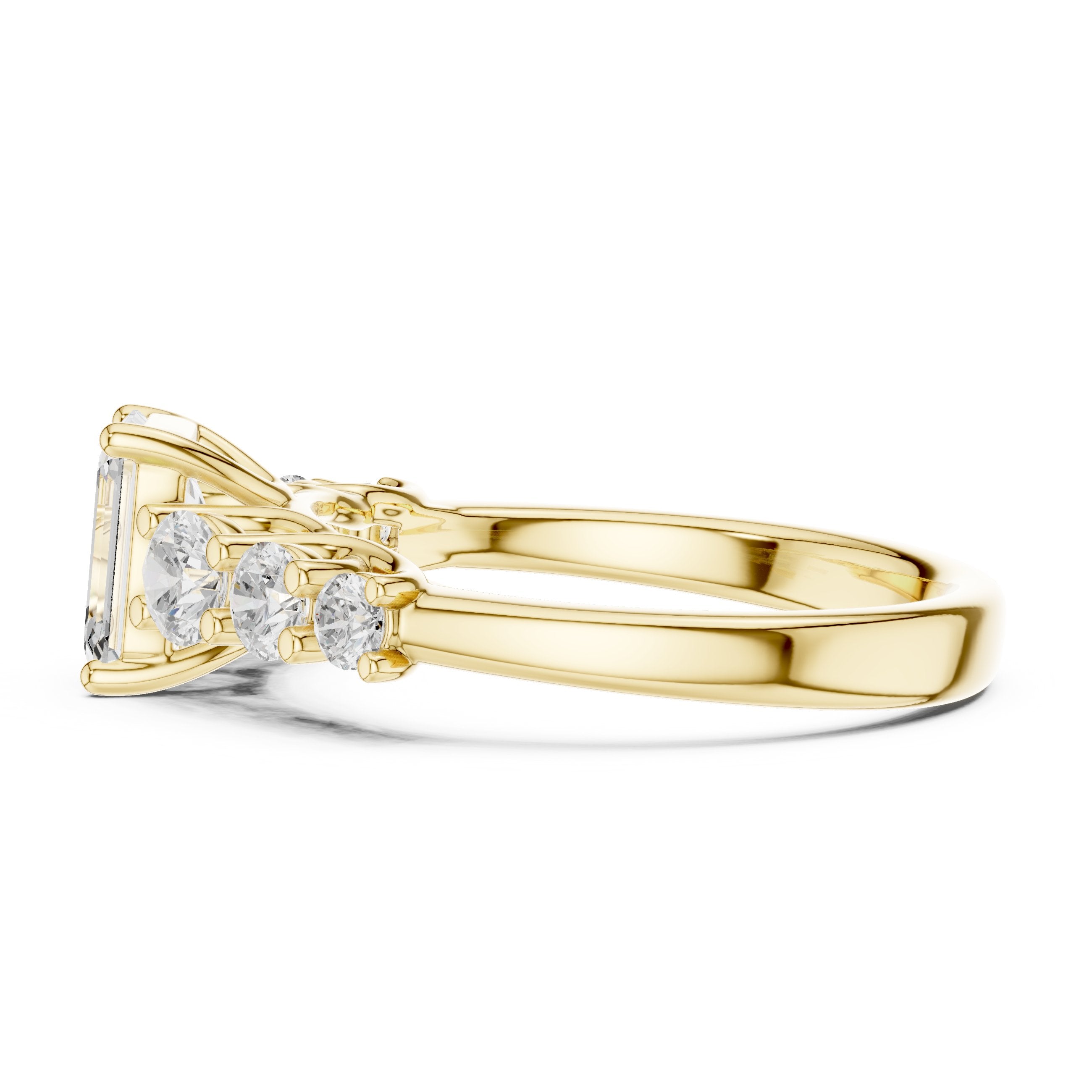 Emerald Cut Engagement Ring with Round Side Accents on Chevron Shoulders in Yellow Gold - VYKA Diamonds