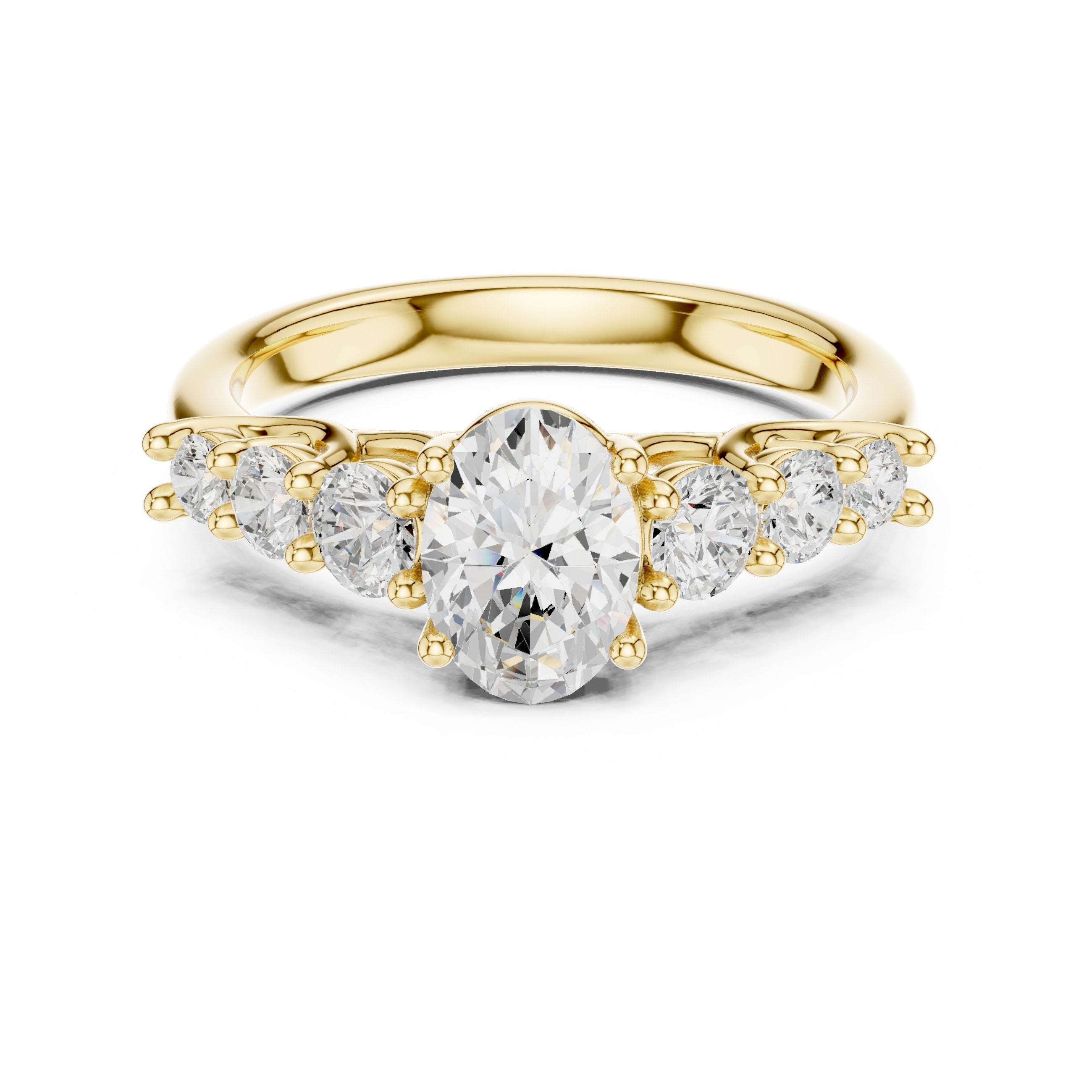 Oval Diamond Engagement Ring with Graduated Round Side Accents in Yellow Gold - VYKA Diamonds