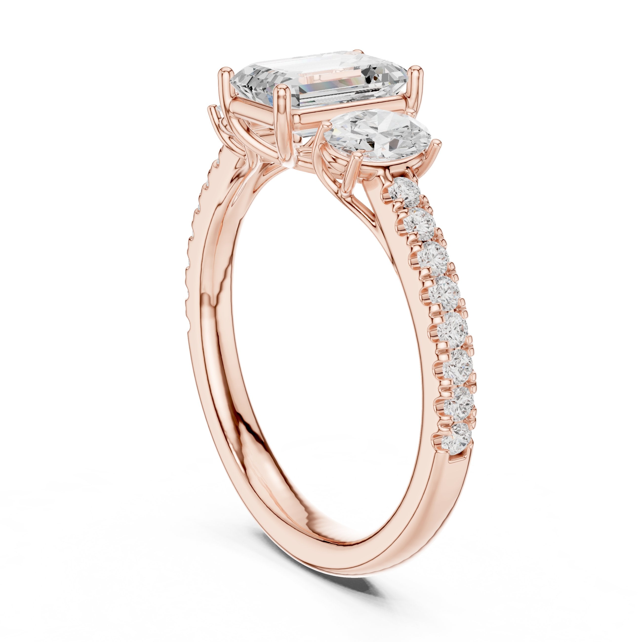 Emerald Cut Three Stone Engagement Ring with Oval Sides and Pavé Band in Rose Gold - VYKA Diamonds