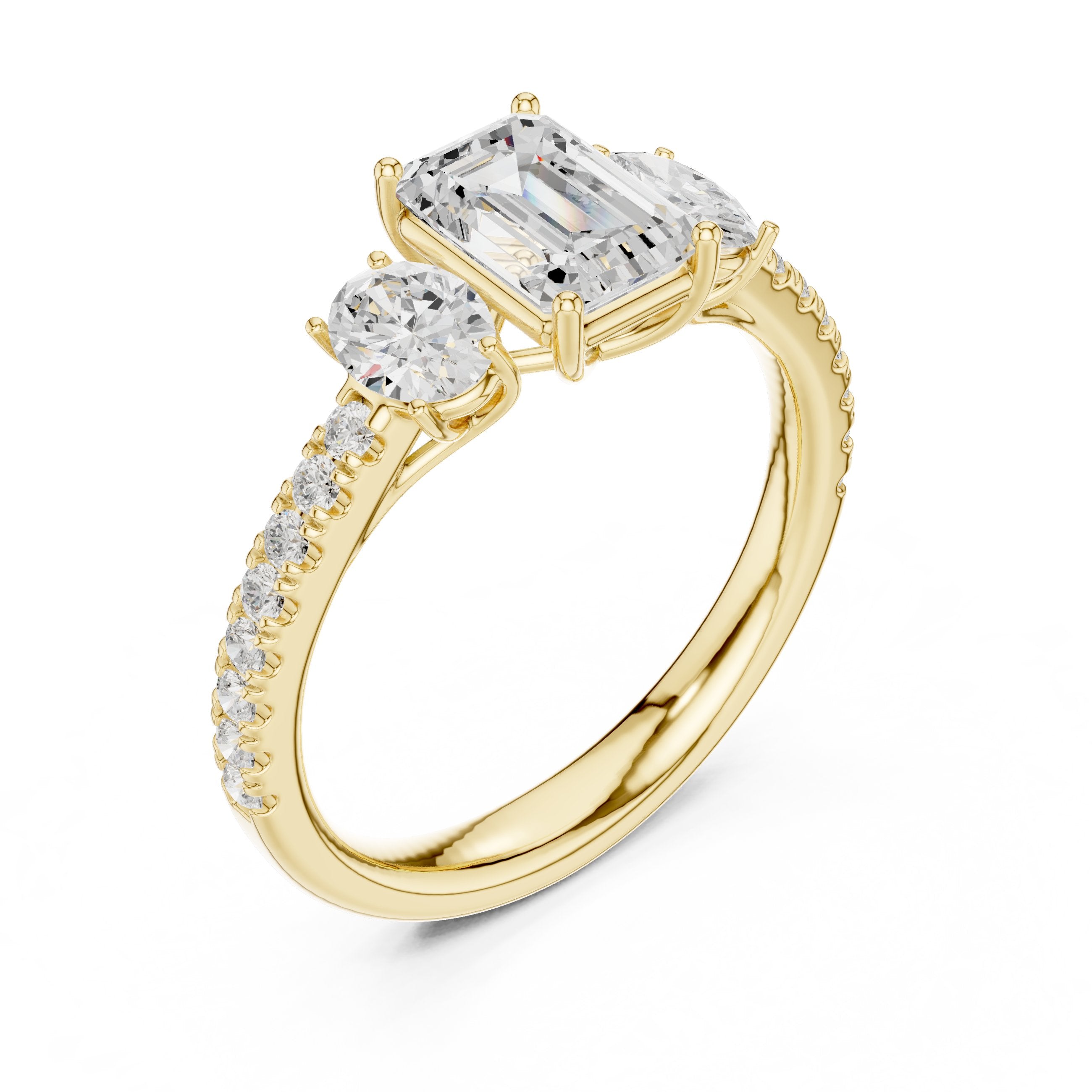 Emerald Cut Three Stone Engagement Ring with Oval Sides and Pavé Band in Yellow Gold - VYKA Diamonds