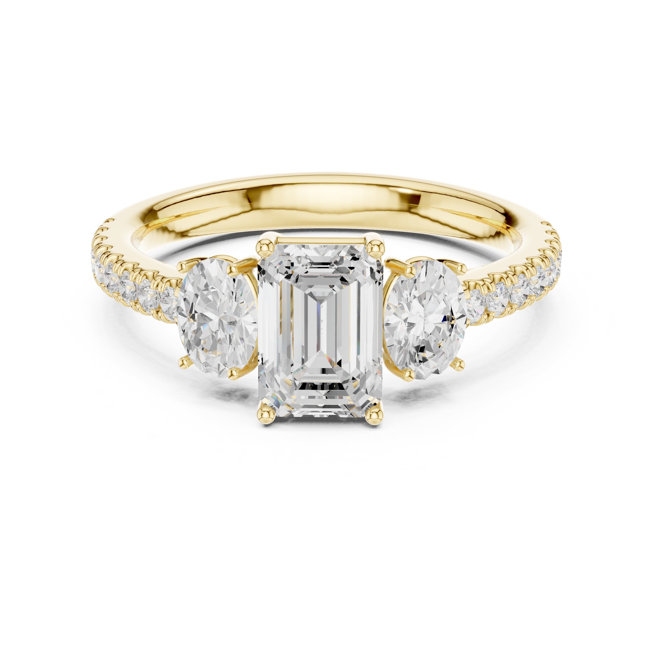 Emerald Cut Three Stone Engagement Ring with Oval Sides and Pavé Band in Yellow Gold - VYKA Diamonds