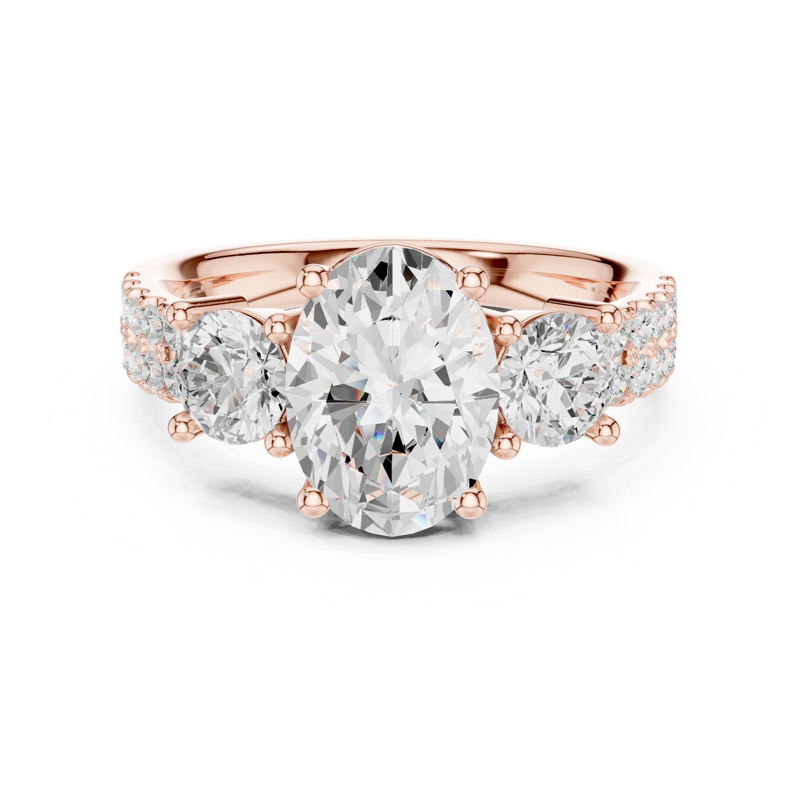Oval Diamond Three Stone Engagement Ring with Round Sides and Pavé Band in Rose Gold - VYKA Diamonds