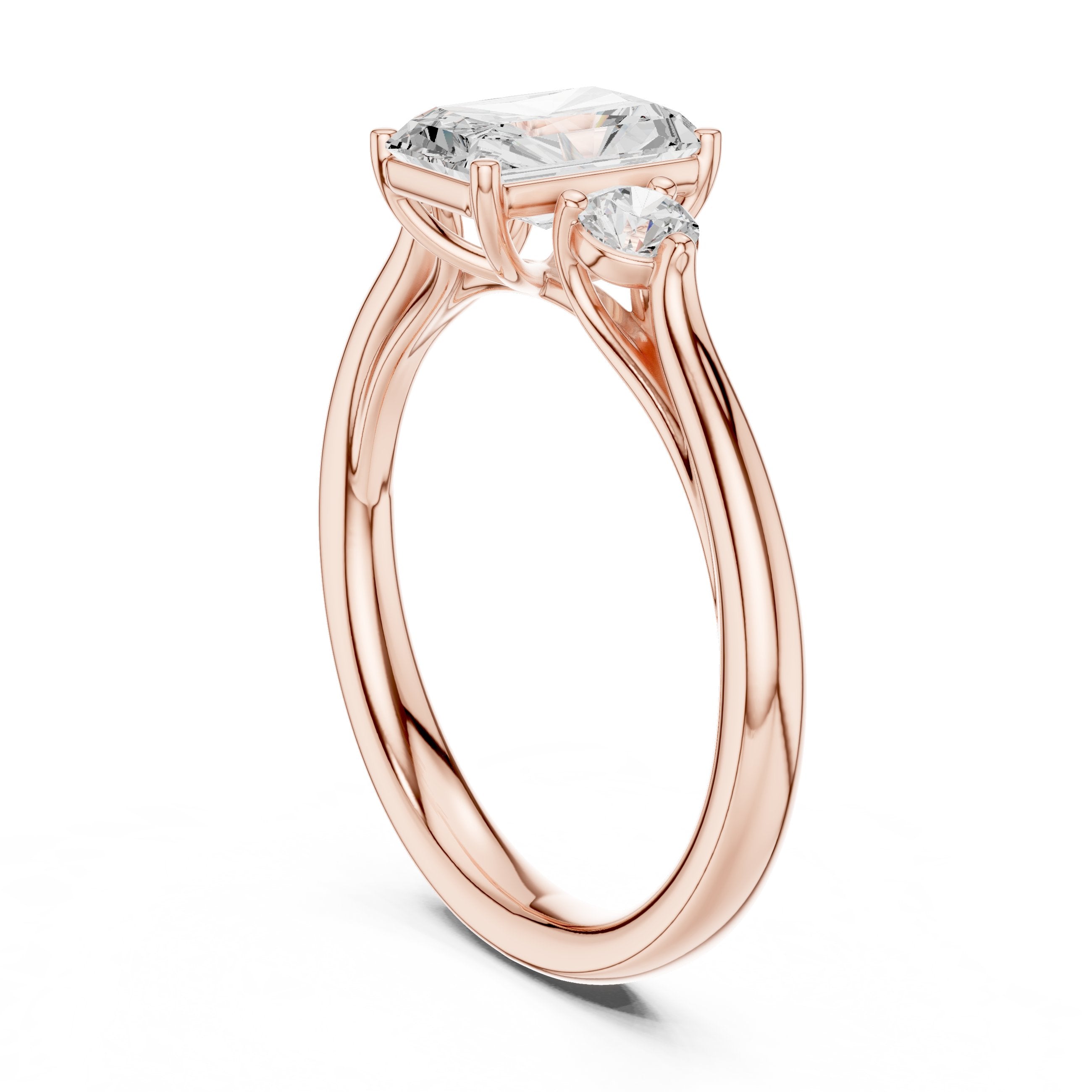 Emerald Cut Three Stone with Pear Shaped Diamonds in Rose Gold - VYKA Diamonds