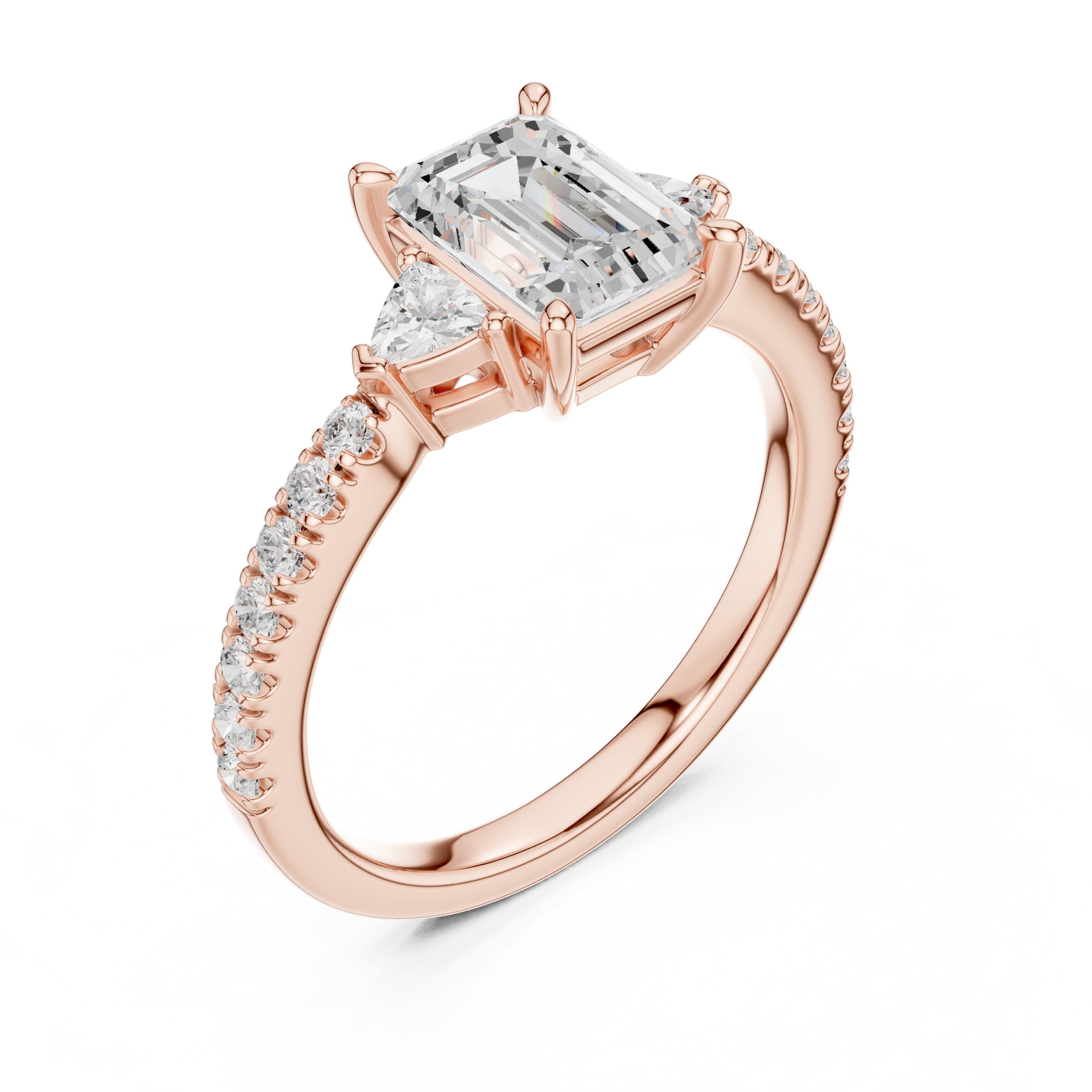 Emerald Cut Three Stone Engagement Ring with Trilliant Sides and Pavé Band in Rose Gold - VYKA Diamonds