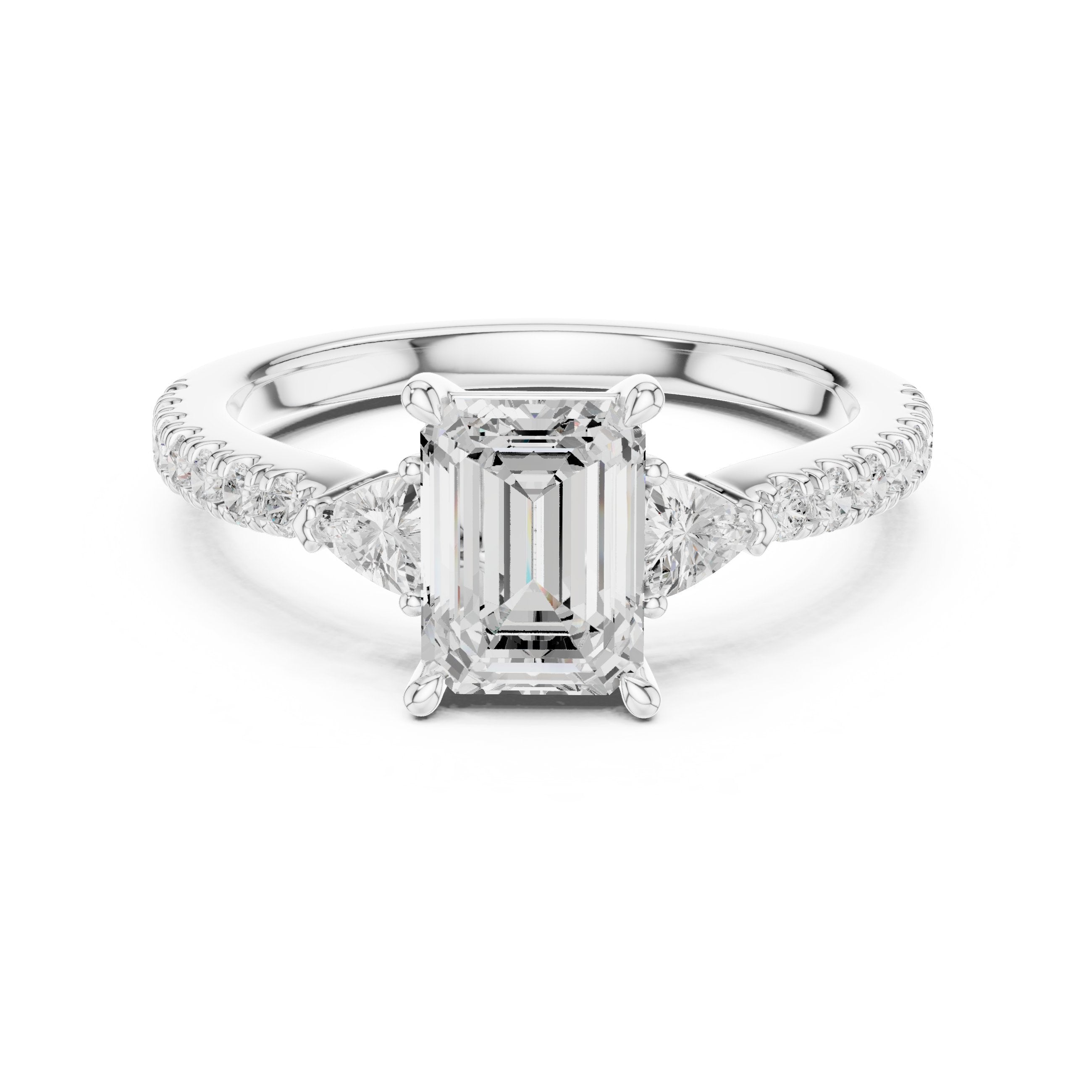 Emerald Cut Three Stone Engagement Ring with Trilliant Sides and Pavé Band in White Gold - VYKA Diamonds