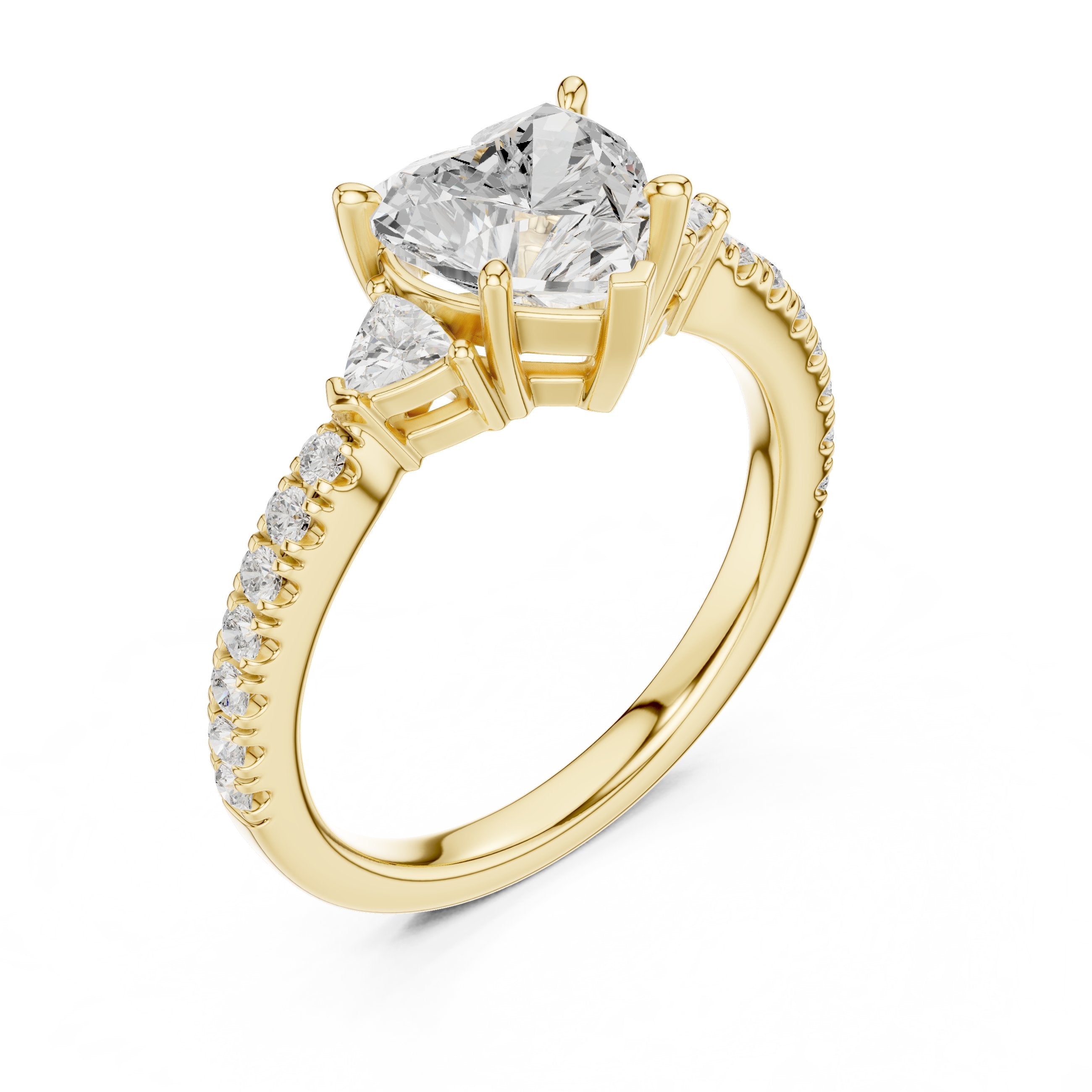 Heart Cut Three Stone Engagement Ring with Trilliant Sides and Pavé Band in Yellow Gold - VYKA Diamonds