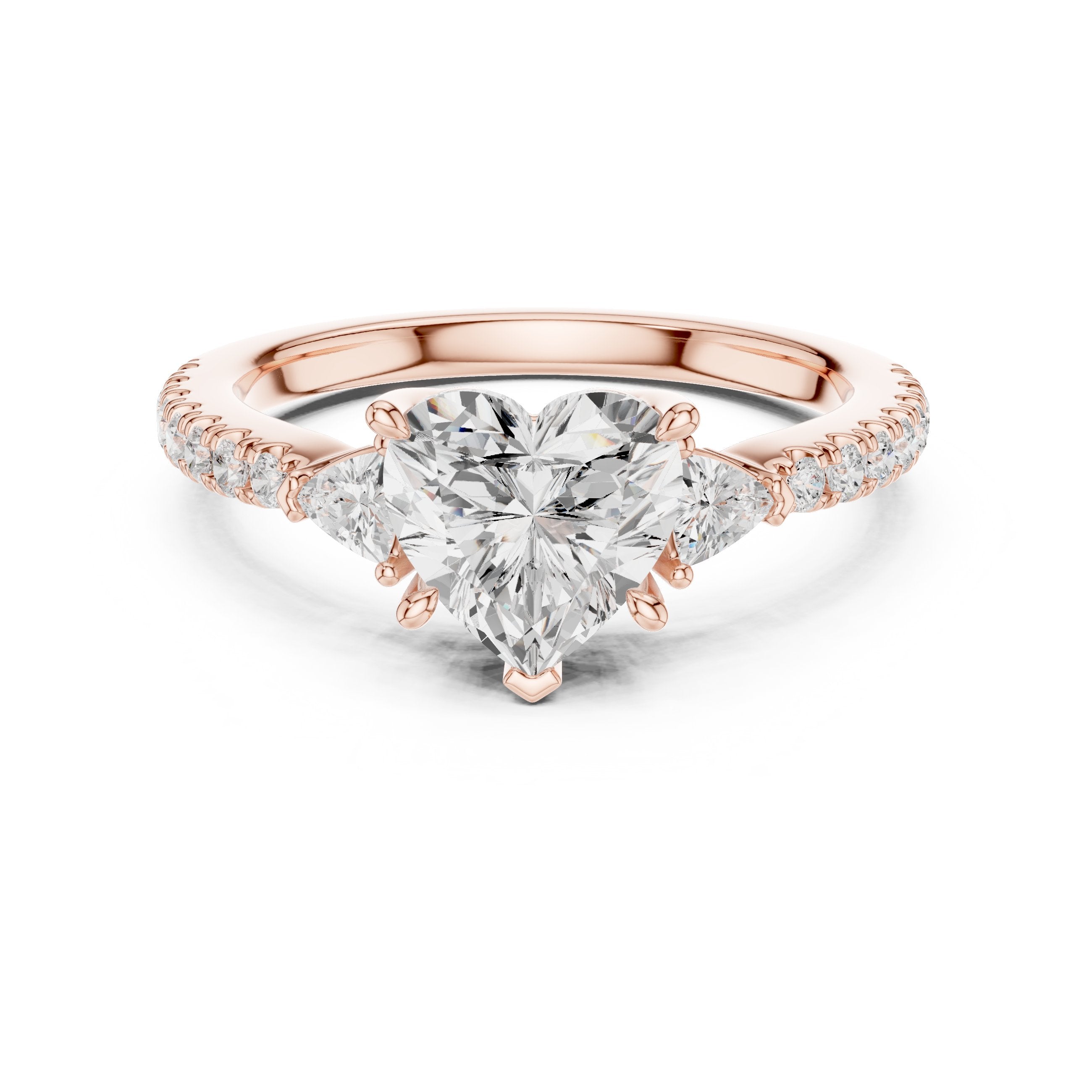 Heart Cut Three Stone Engagement Ring with Trilliant Sides and Pavé Band in Rose Gold - VYKA Diamonds