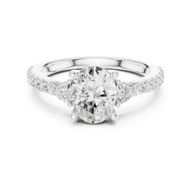 Oval Diamond Three Stone Engagement Ring with Trilliant Sides and Pavé Band