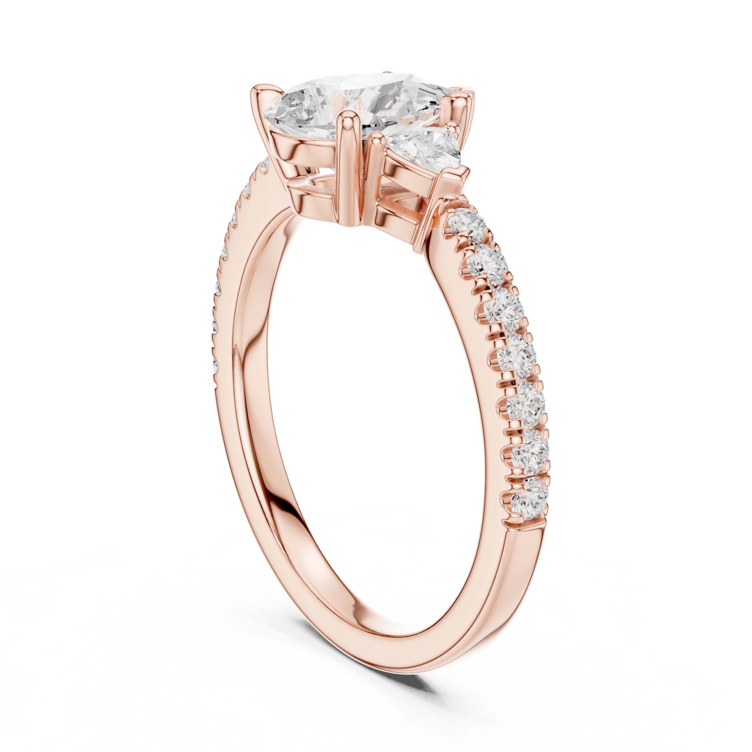 Pear Diamond Three Stone Engagement Ring with Trilliant Sides and Pavé Band in Rose Gold - VYKA Diamonds