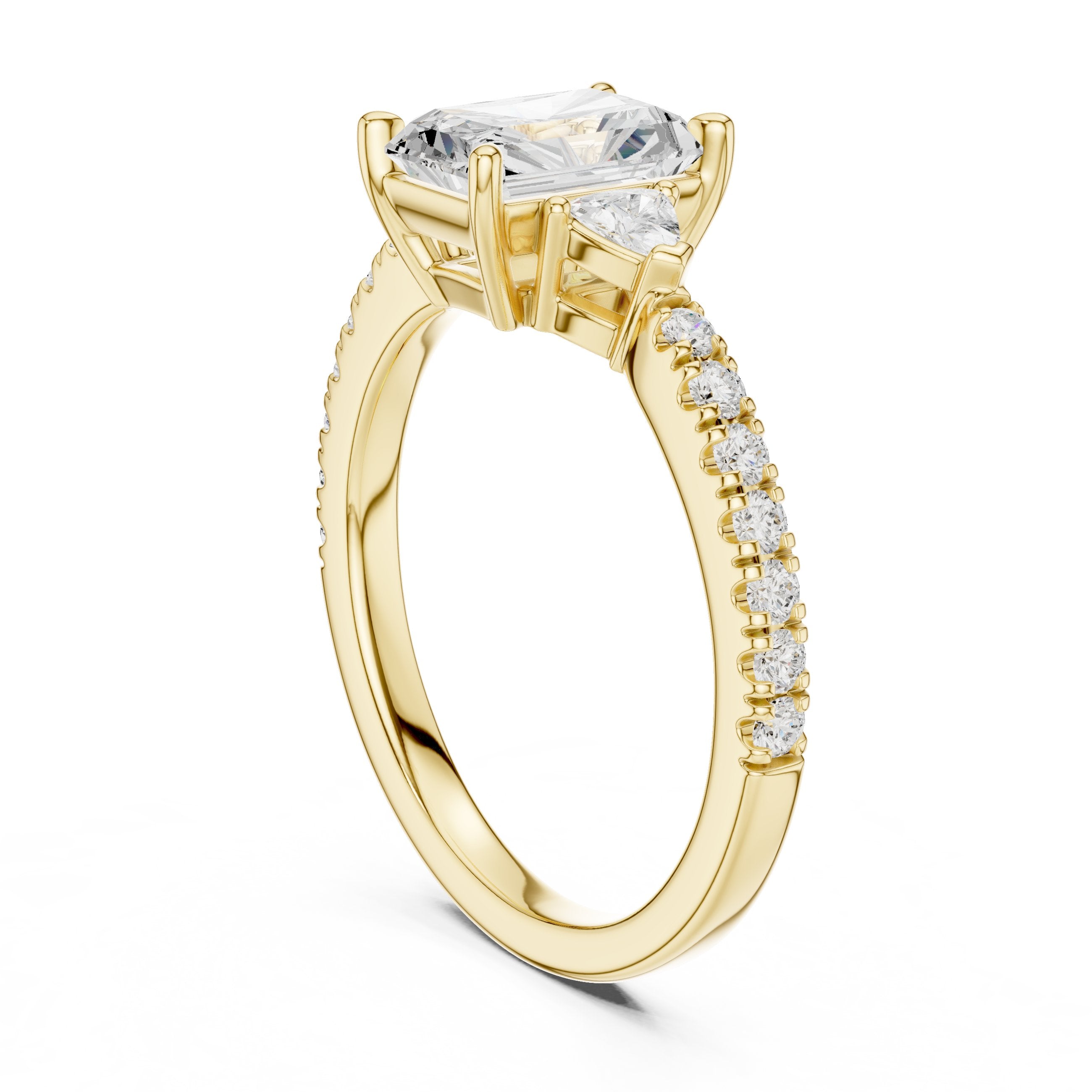 Radiant Cut Three Stone Engagement Ring with Trilliant Sides and Pavé Band in Yellow Gold - VYKA Diamonds