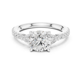 Round Diamond Three Stone Engagement Ring with Trilliant Sides and Pavé Band