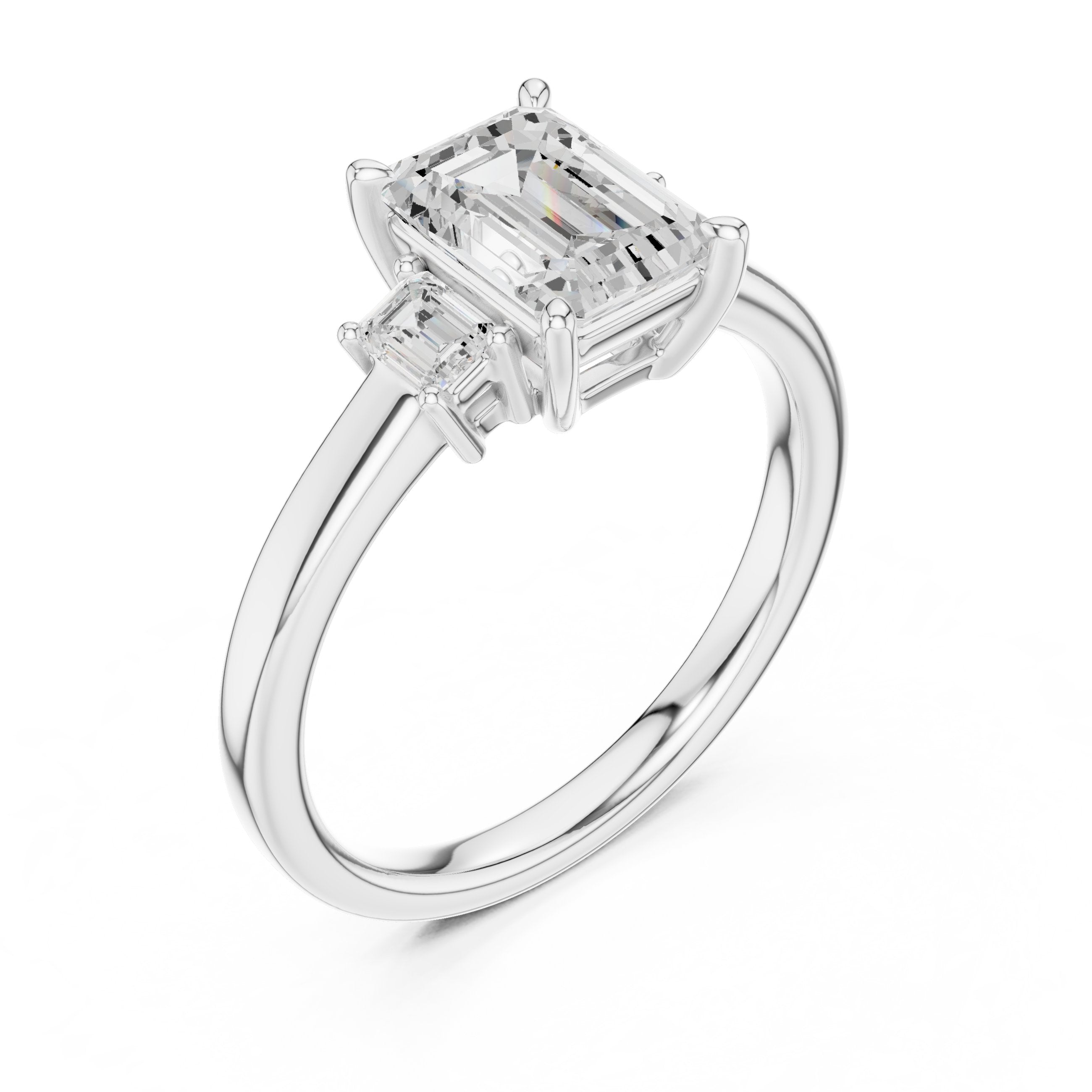 Emerald Cut Three Stone Engagement Ring in White Gold - VYKA Diamonds