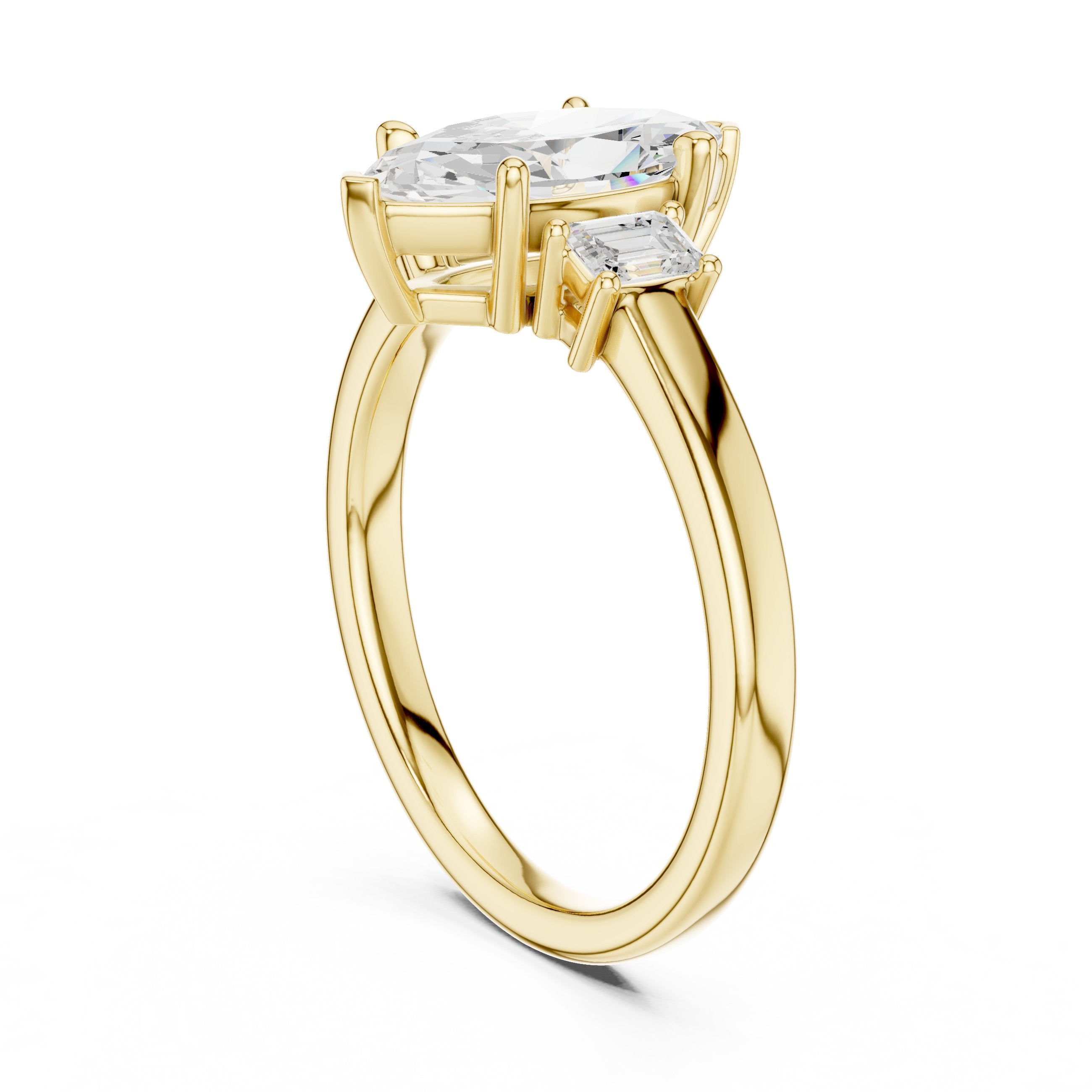 Marquise Cut Three Stone Engagement Ring with Emerald Sides in Yellow Gold - VYKA Diamonds
