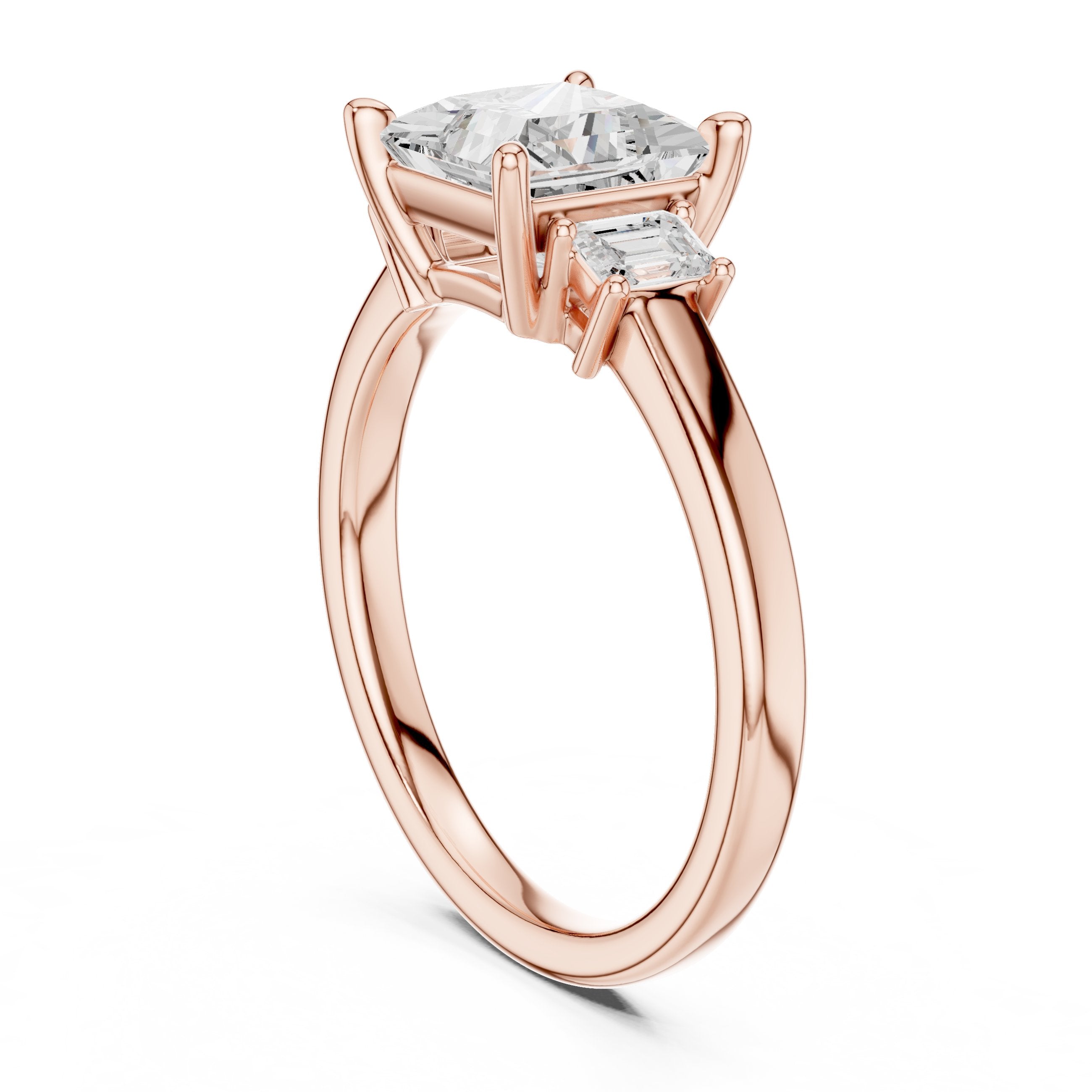 Princess Cut Three Stone Engagement Ring with Tapered Baguette Sides in Rose Gold - VYKA Diamonds