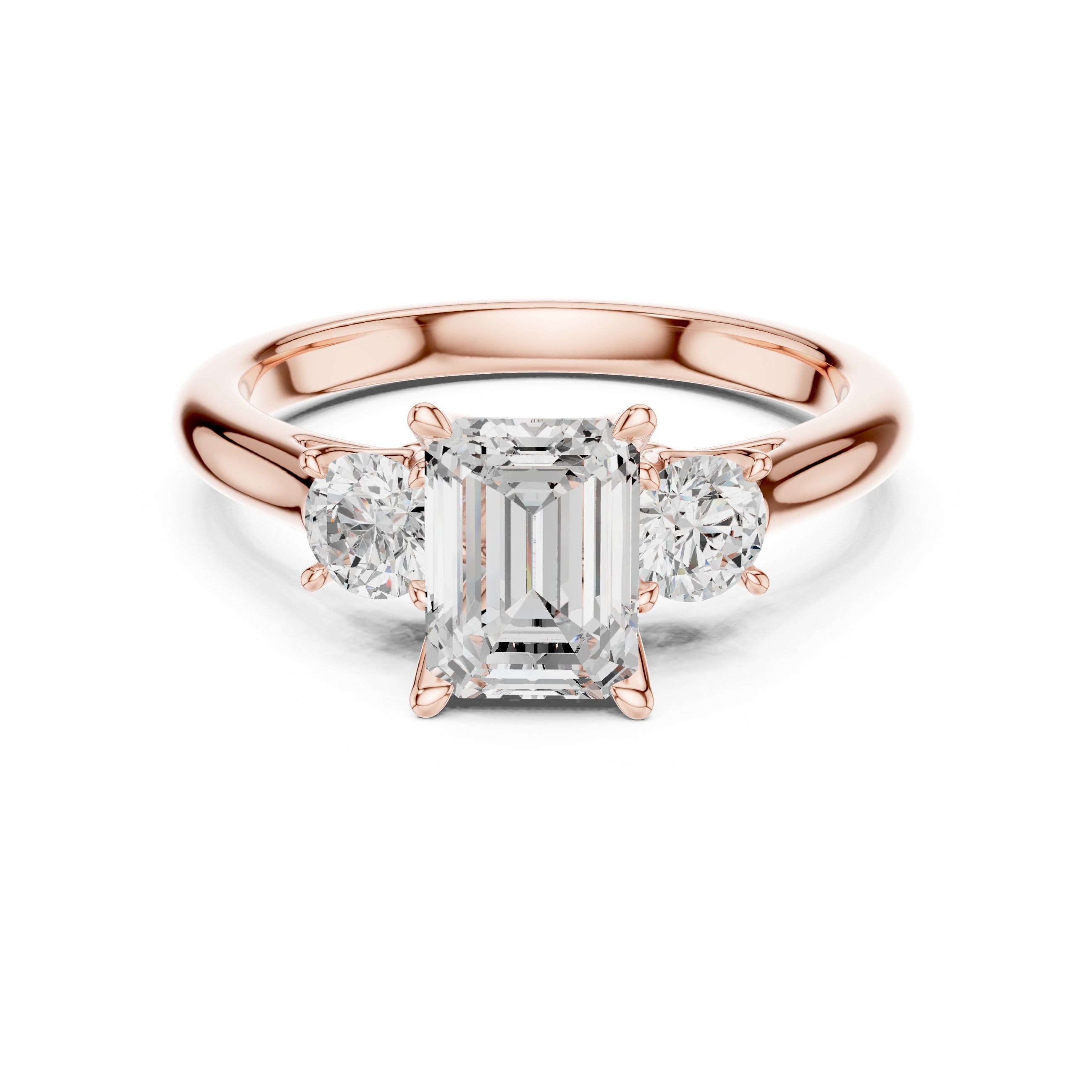 Emerald Cut Three Stone Engagement Ring with Round Sides in Rose Gold - VYKA Diamonds