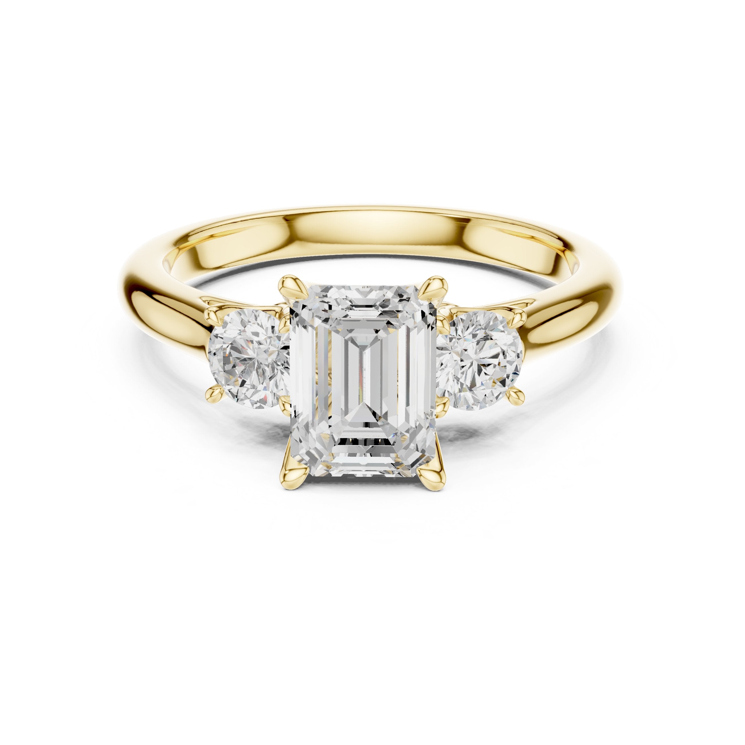 Emerald Cut Three Stone Engagement Ring with Round Sides in Yellow Gold - VYKA Diamonds