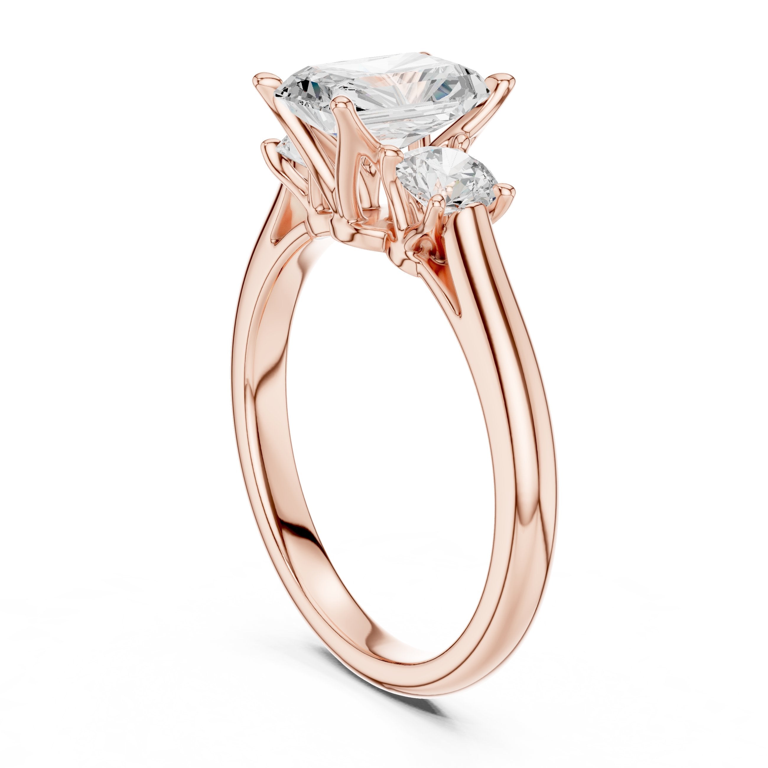 Radiant Cut Three Stone Engagement Ring with Round Sides in Rose Gold - VYKA Diamonds