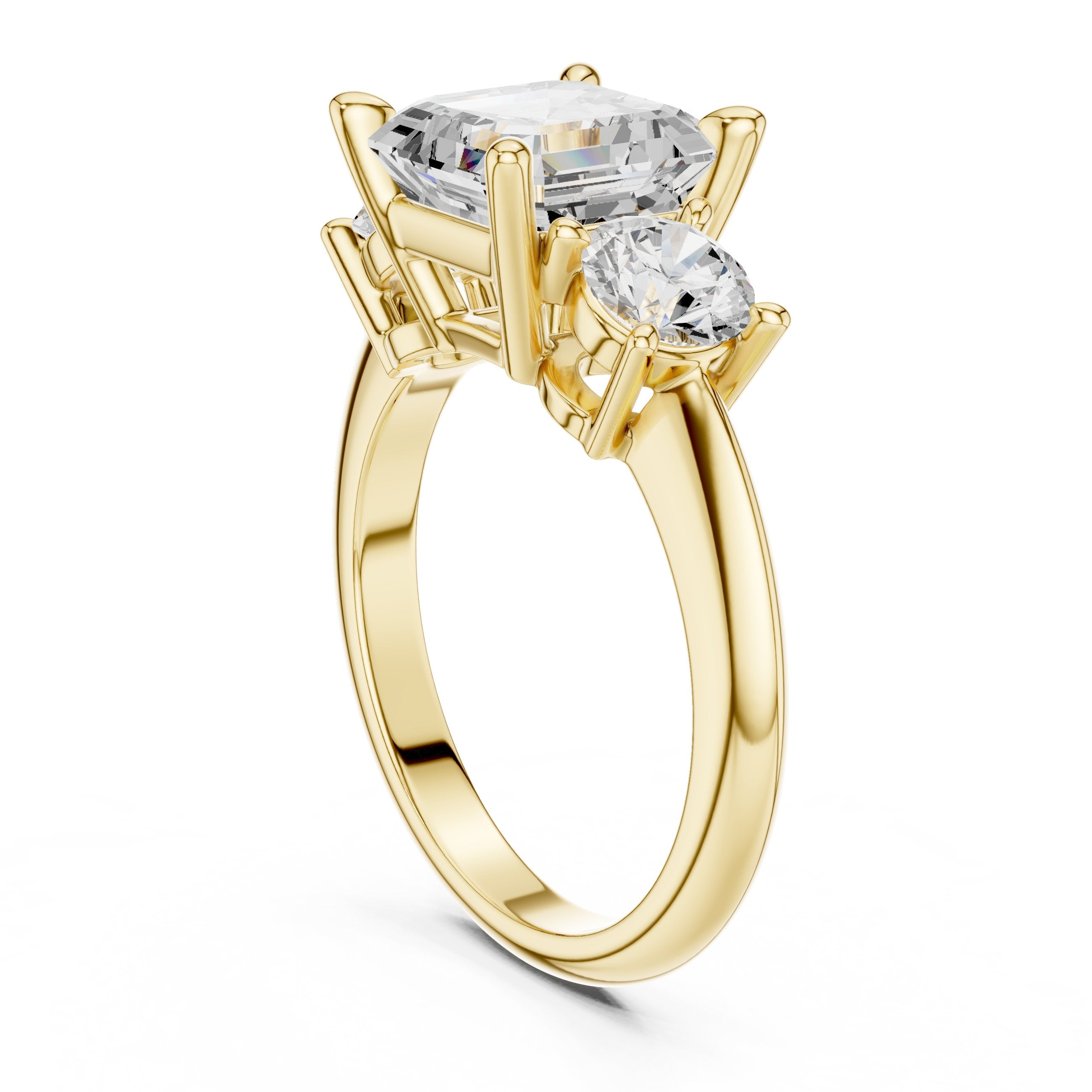 Asscher Cut Three Stone Engagement Ring with Round Sides in Yellow Gold - VYKA Diamonds