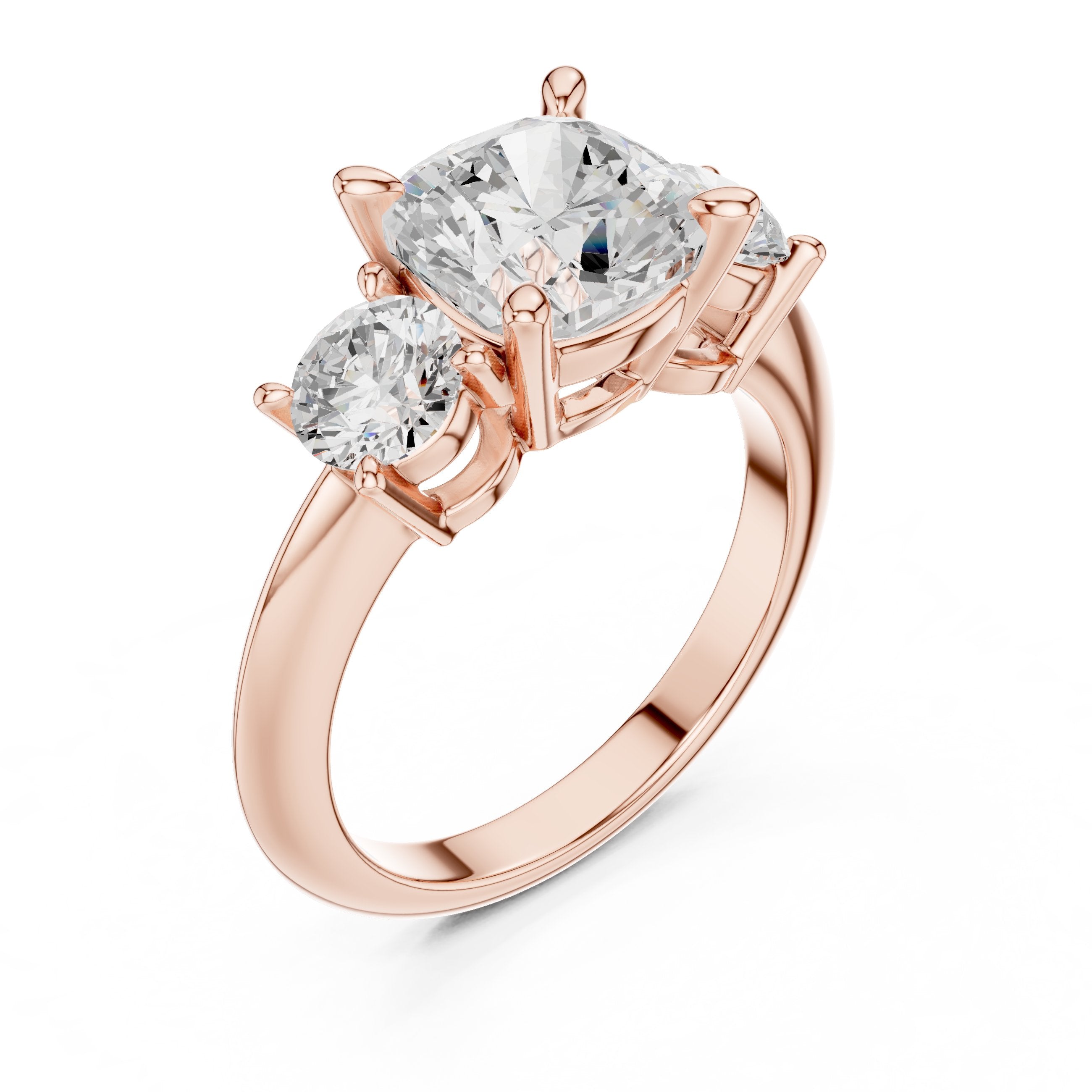 Cushion Cut Three Stone Engagement Ring with Round Sides in Rose Gold - VYKA Diamonds