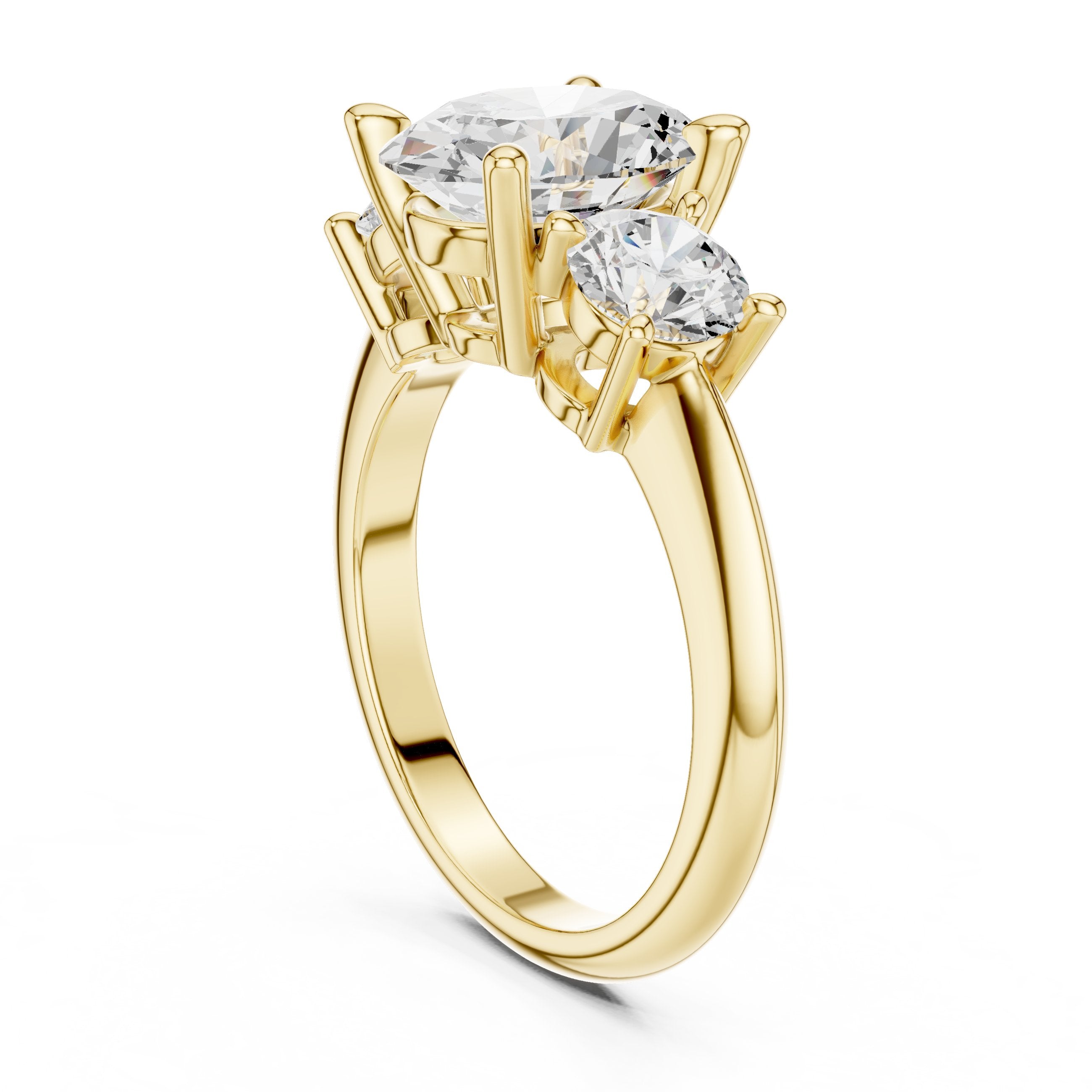 Oval Diamond Three Stone Engagement Ring with Round Sides in Yellow Gold - VYKA Diamonds