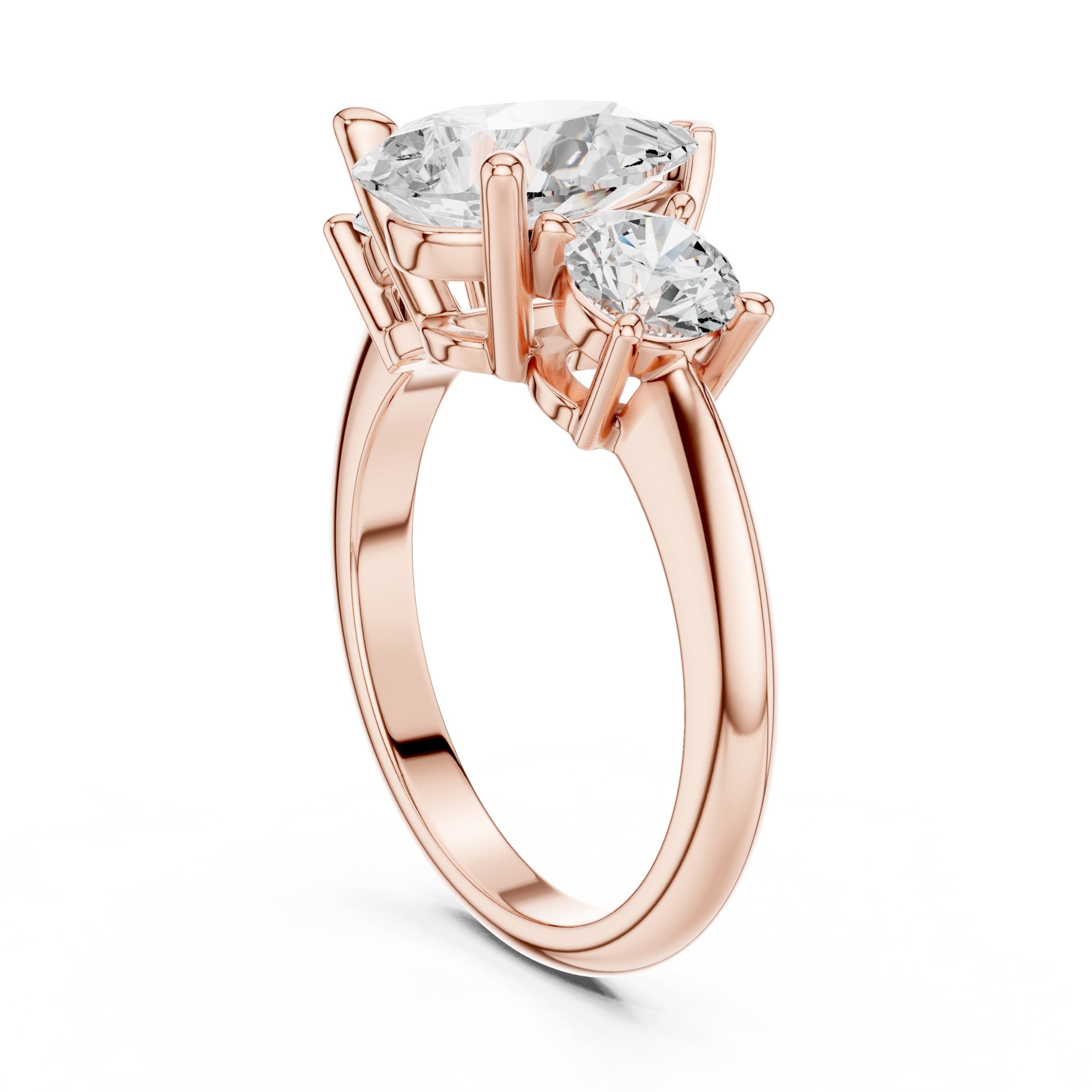 Pear Diamond Three Stone Engagement Ring with Round Sides in Rose Gold - VYKA Diamonds