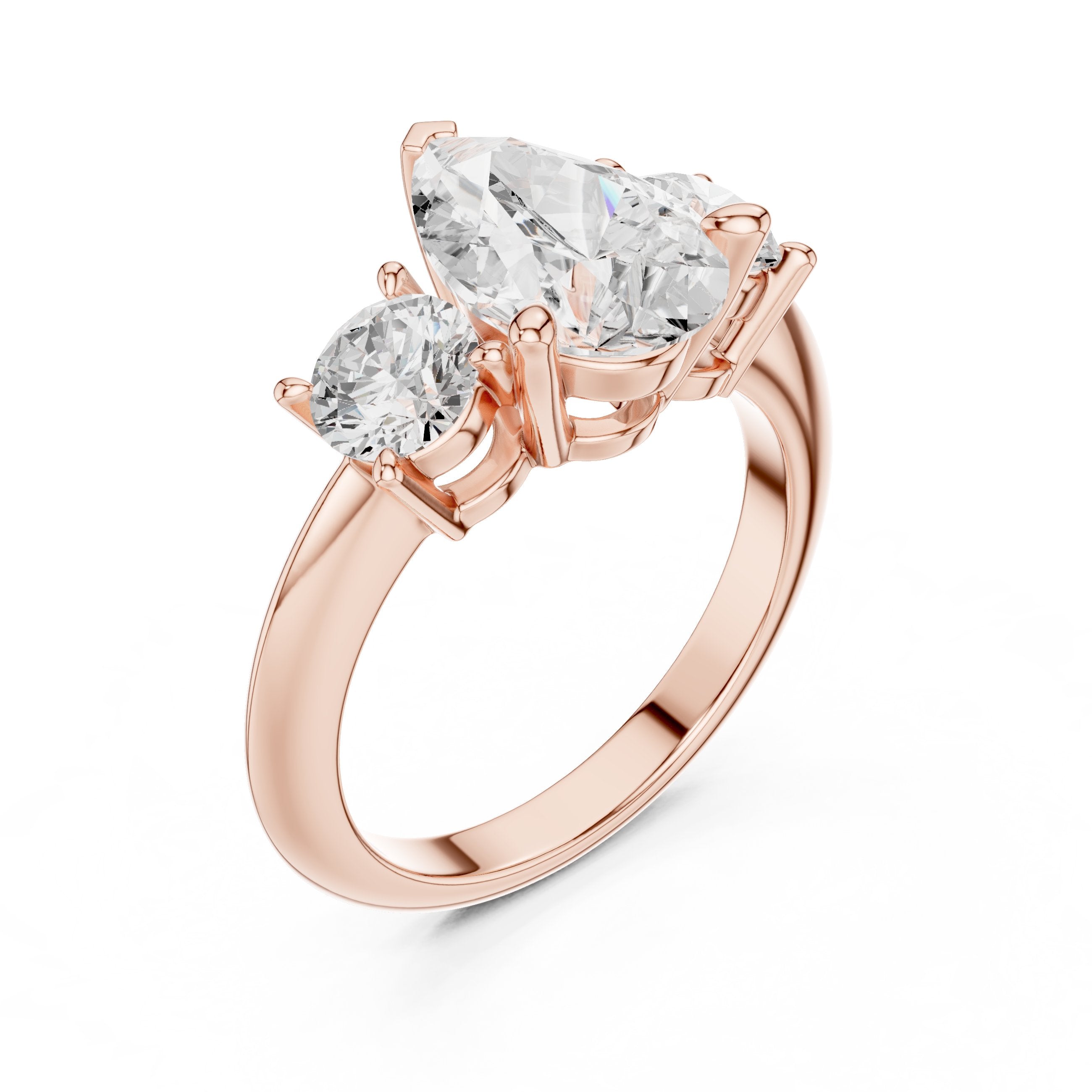 Pear Diamond Three Stone Engagement Ring with Round Sides in Rose Gold - VYKA Diamonds