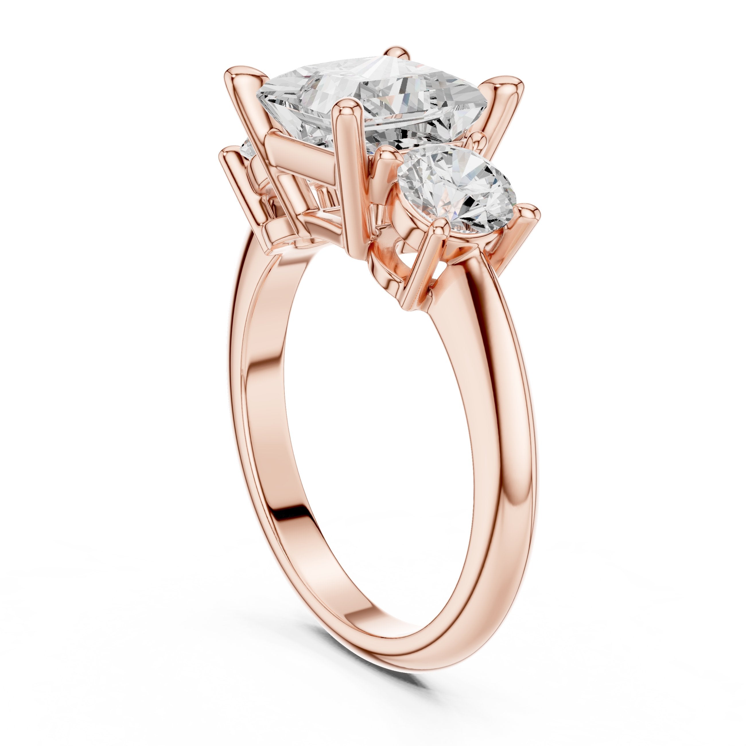 Princess Cut Three Stone Engagement Ring with Round Sides in Rose Gold - VYKA Diamonds