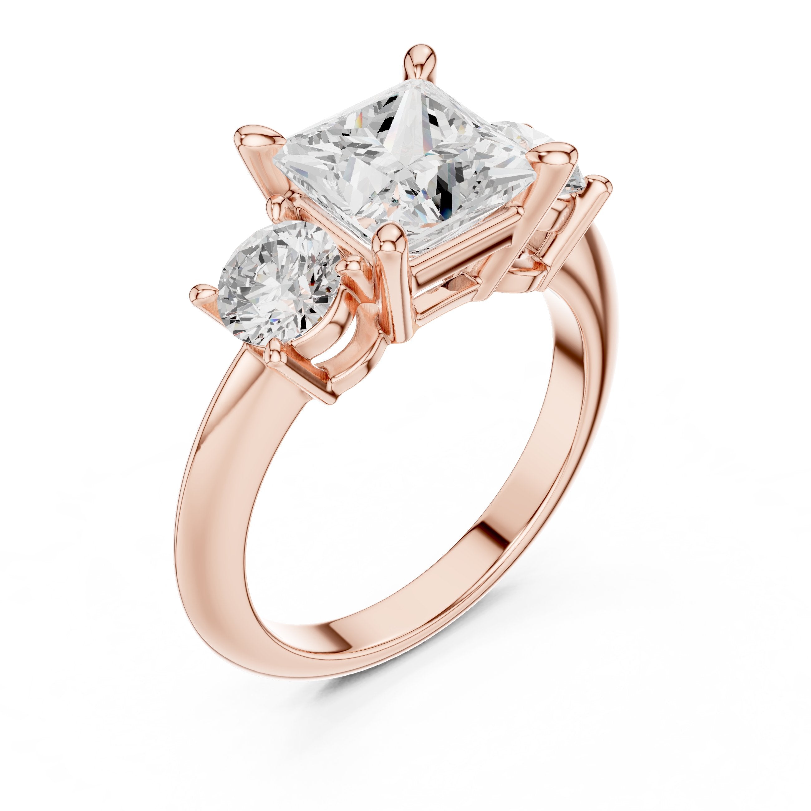 Princess Cut Three Stone Engagement Ring with Round Sides in Rose Gold - VYKA Diamonds