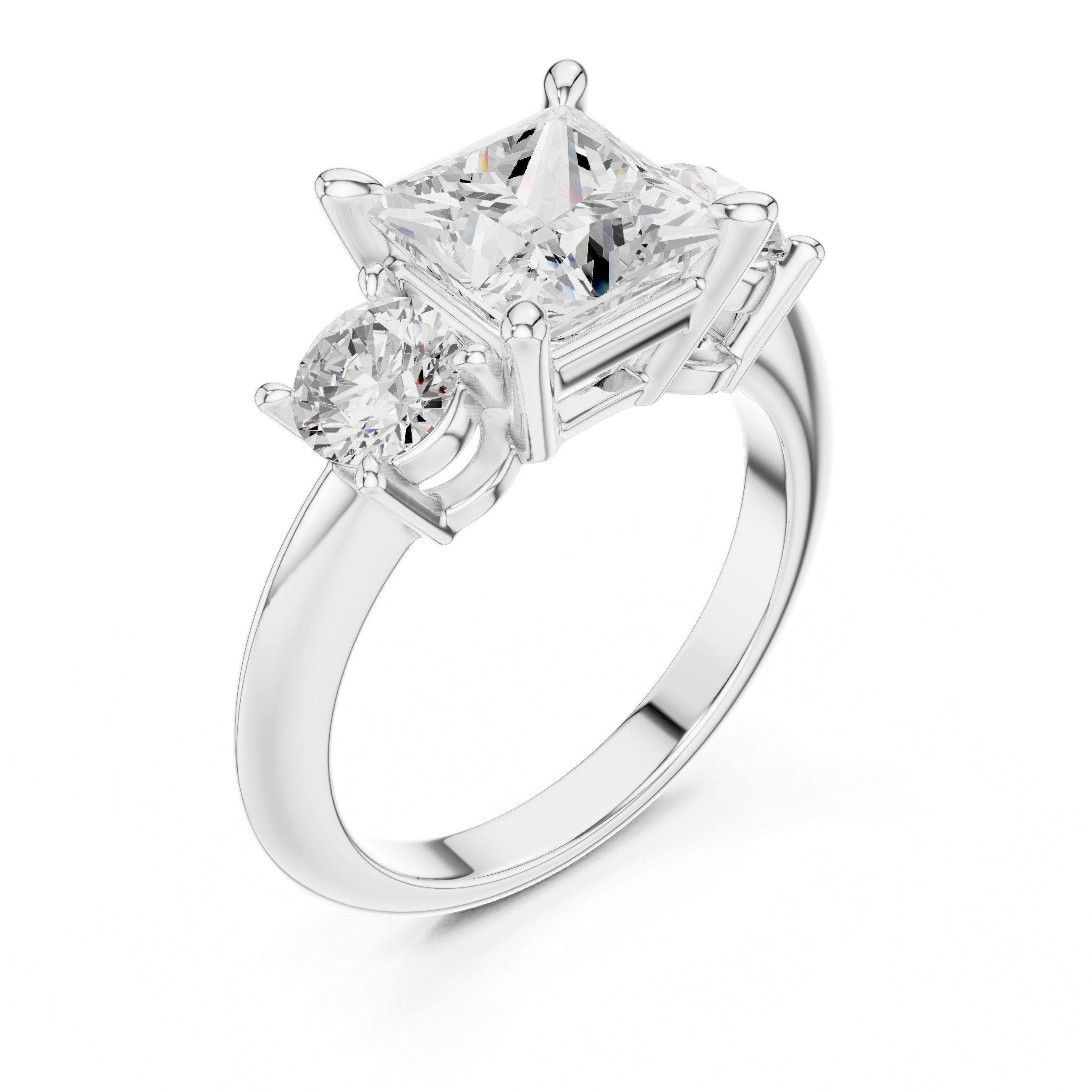 Princess Cut Three Stone Engagement Ring with Round Sides in White Gold - VYKA Diamonds