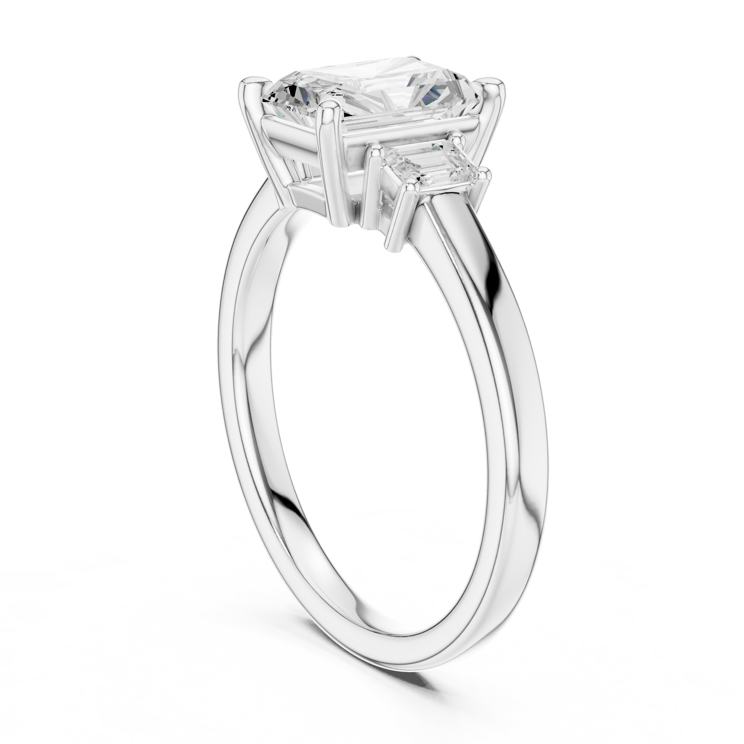 Radiant Cut Three Stone Engagement Ring with Emerald Sides in White Gold - VYKA Diamonds