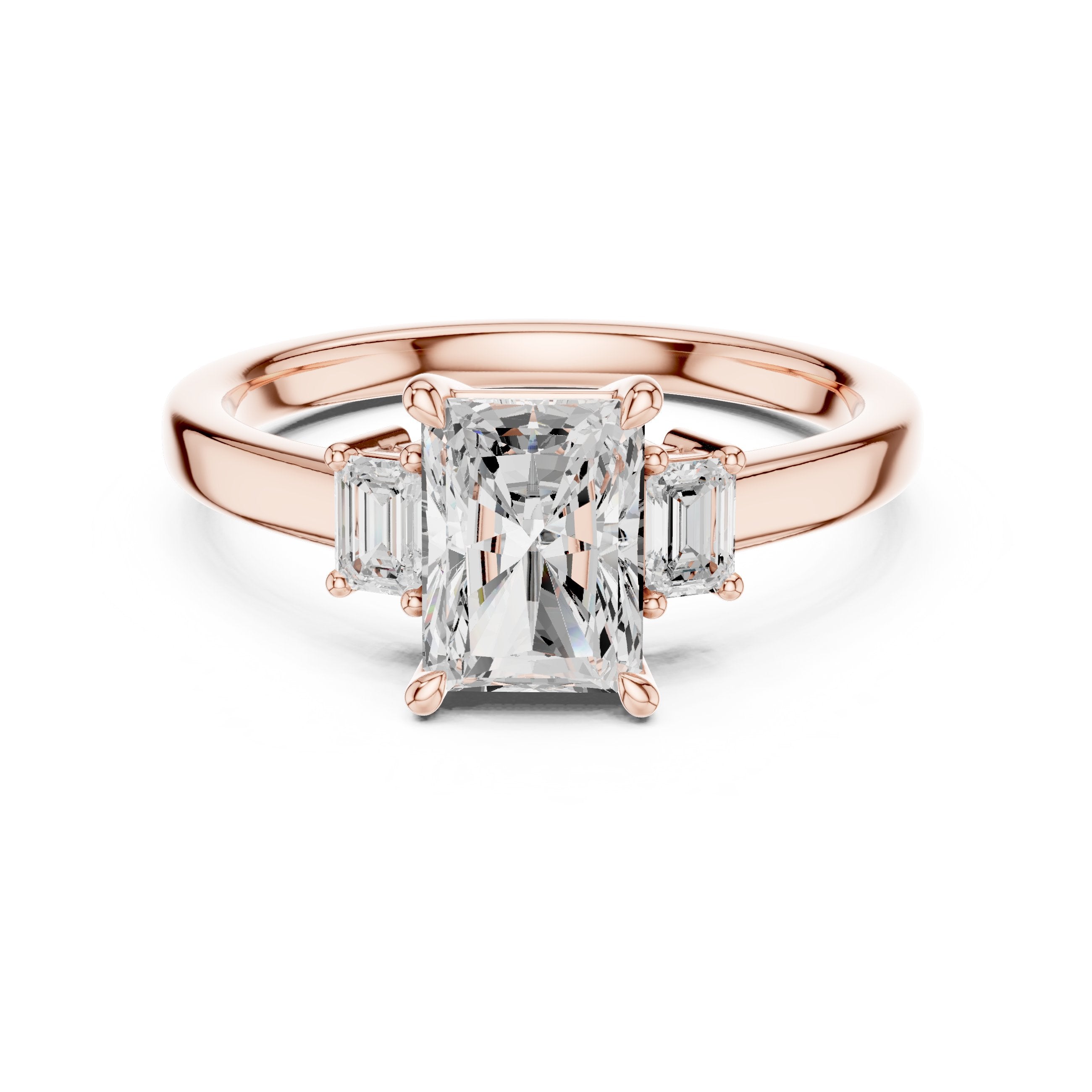 Radiant Cut Three Stone Engagement Ring with Emerald Sides in Rose Gold - VYKA Diamonds