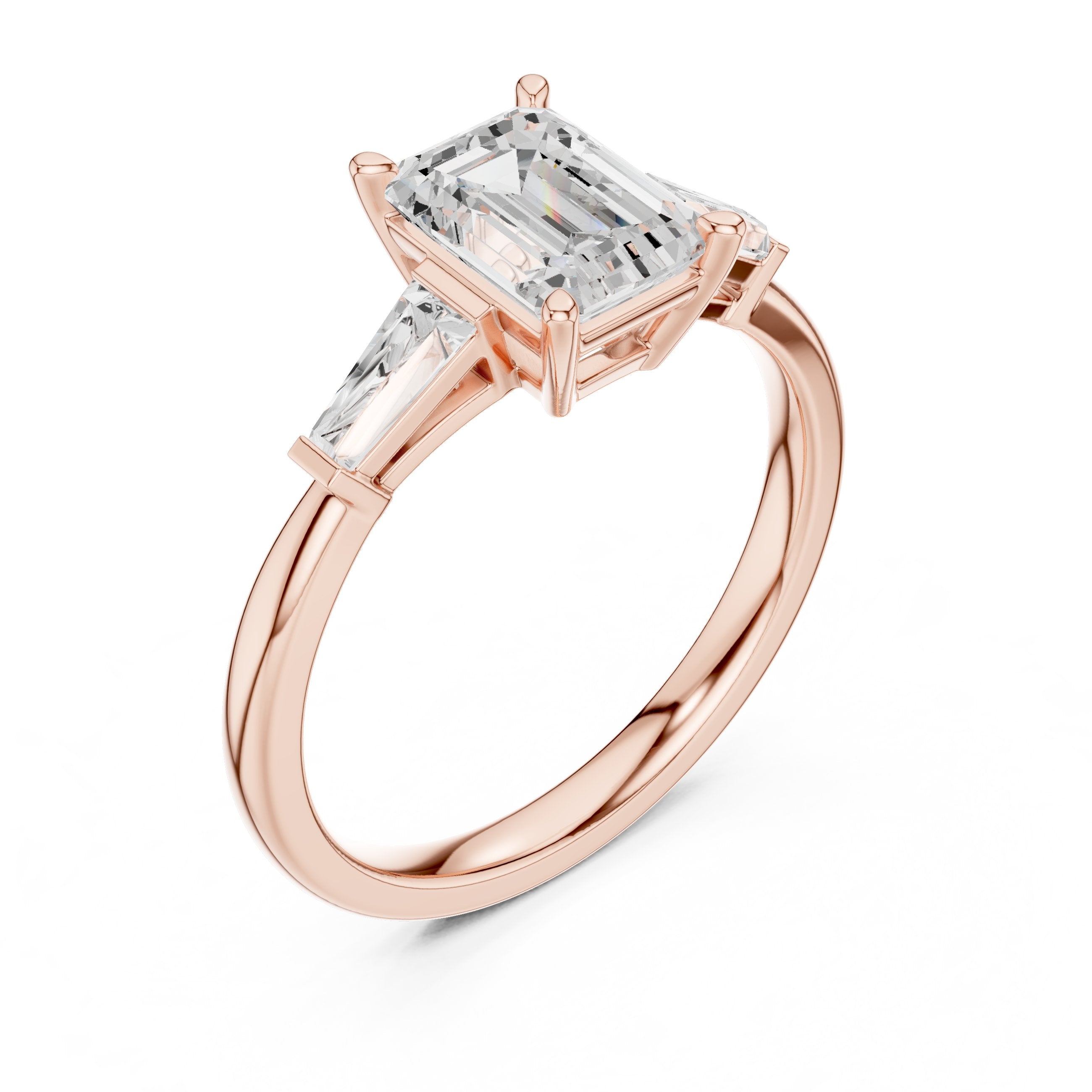 Emerald Cut Three Stone Engagement Ring with Tapered Baguette Sides in Rose Gold - VYKA Diamonds