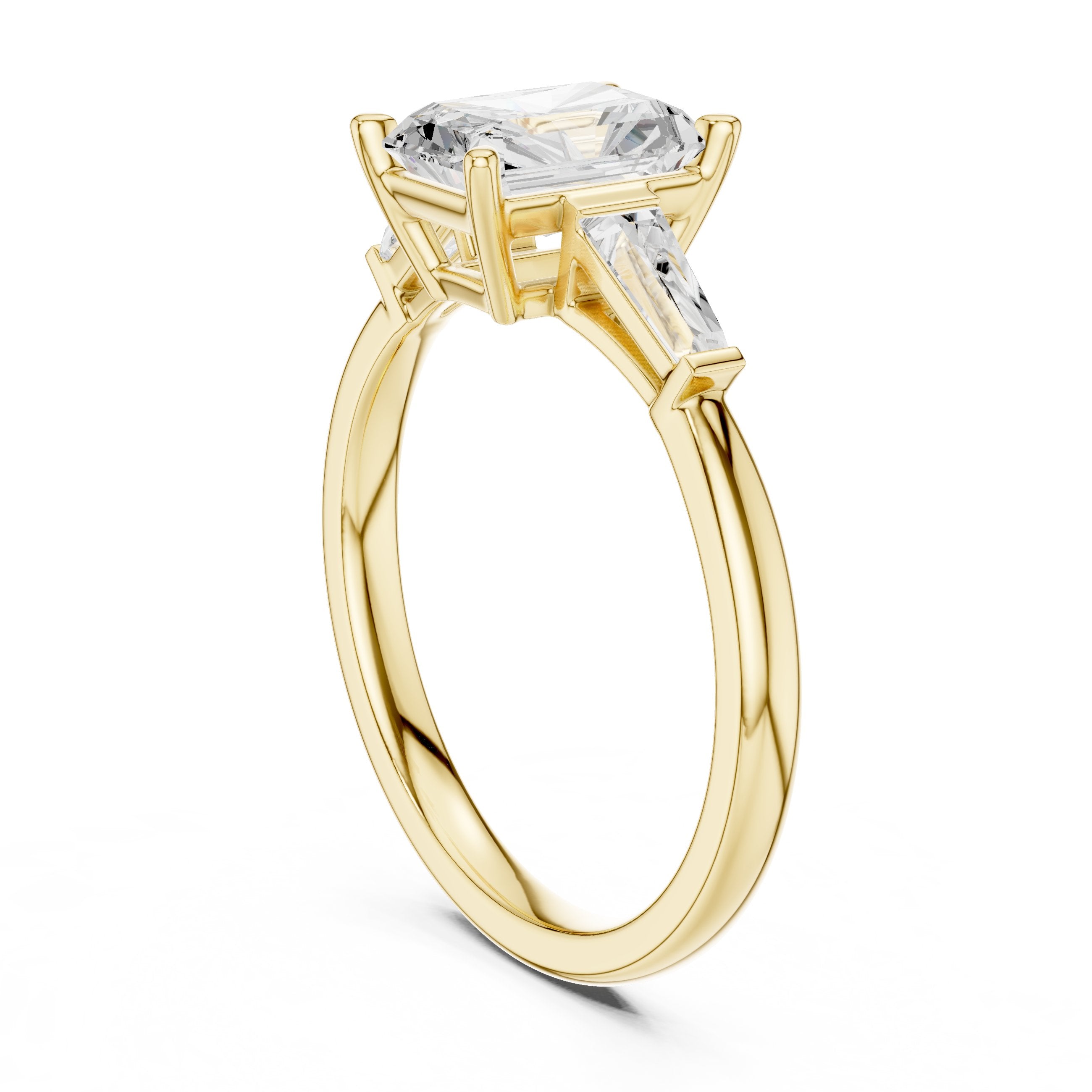 Radiant Cut Three Stone Engagement Ring with Tapered Baguette Sides in Yellow Gold - VYKA Diamonds