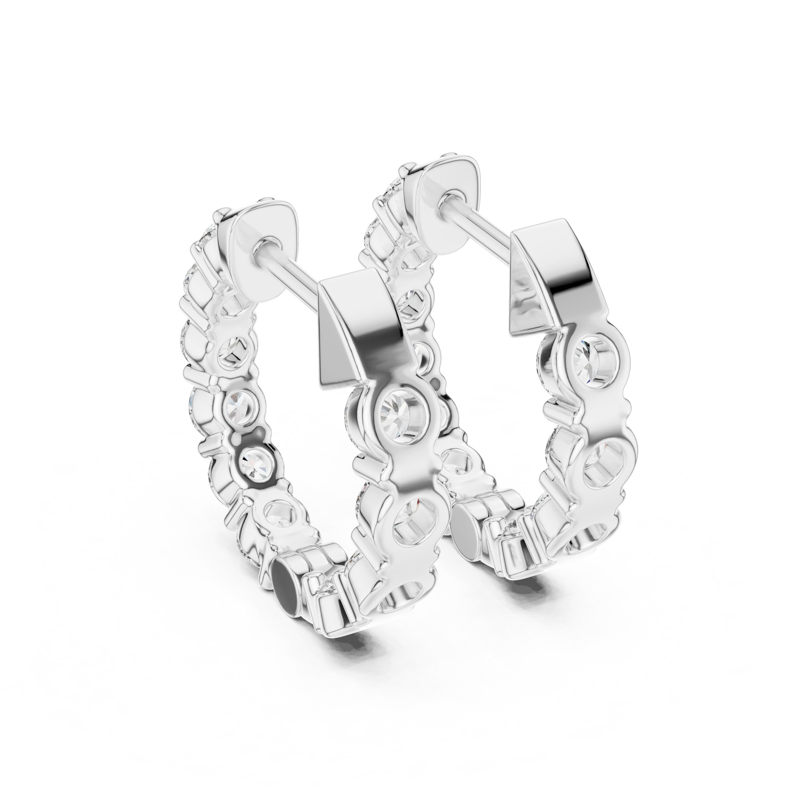 Shared Prong Diamond Huggie Earrings in White Gold - VYKA Diamonds