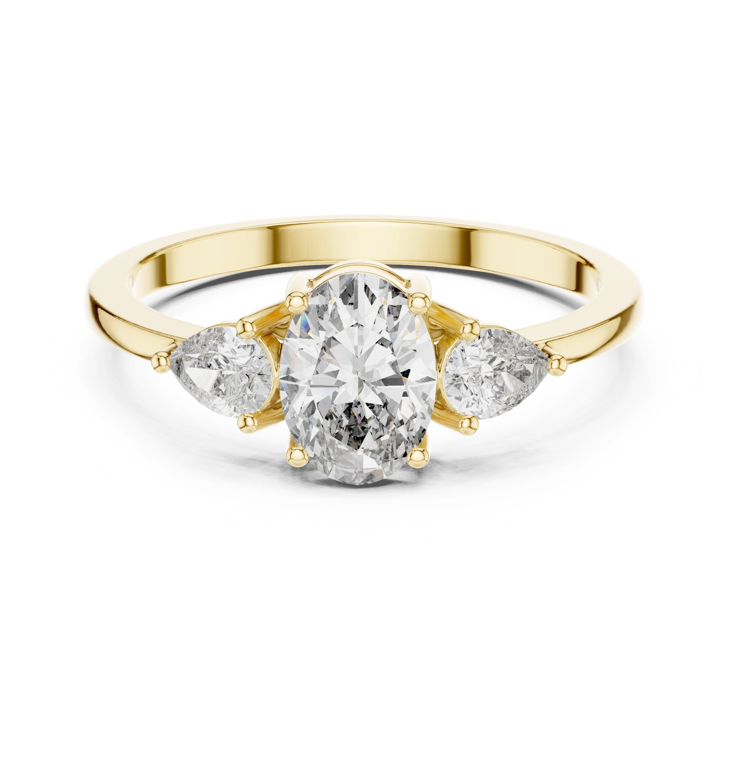 Oval Diamond Three Stone Engagement Ring with Pear Sides in Yellow Gold - VYKA Diamonds