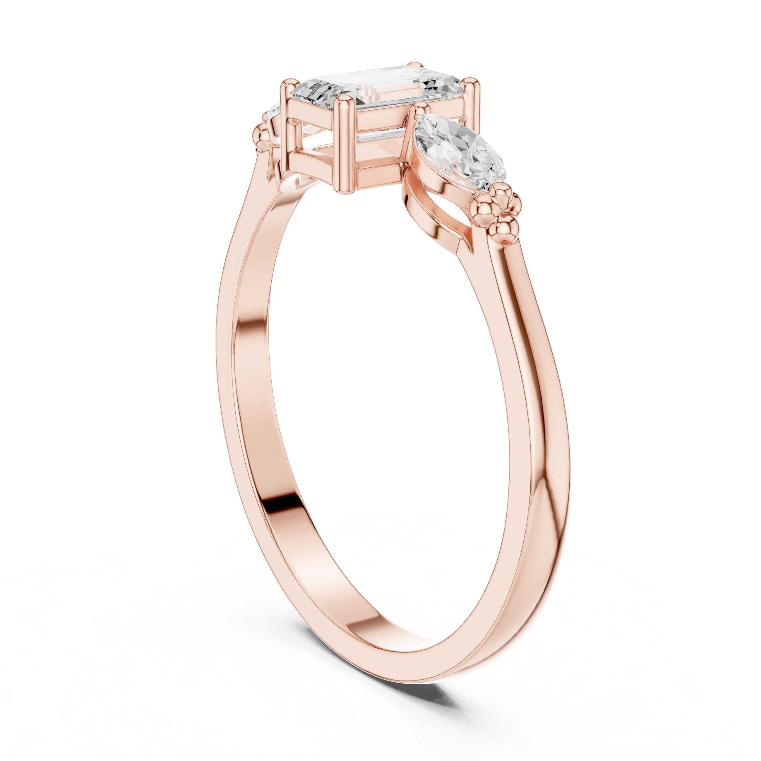 Emerald and Marquise Three Stone Diamond Engagement Ring in Rose Gold - VYKA Diamonds