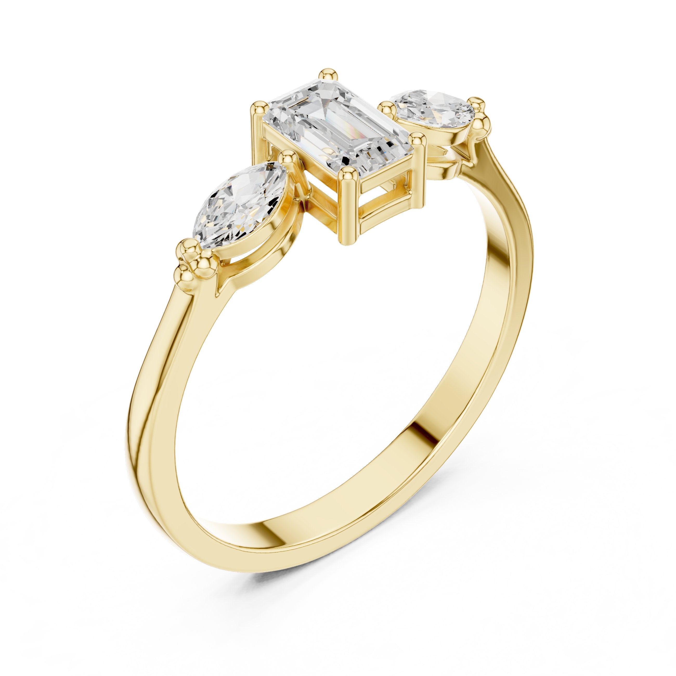 Emerald and Marquise Three Stone Diamond Engagement Ring in Yellow Gold - VYKA Diamonds