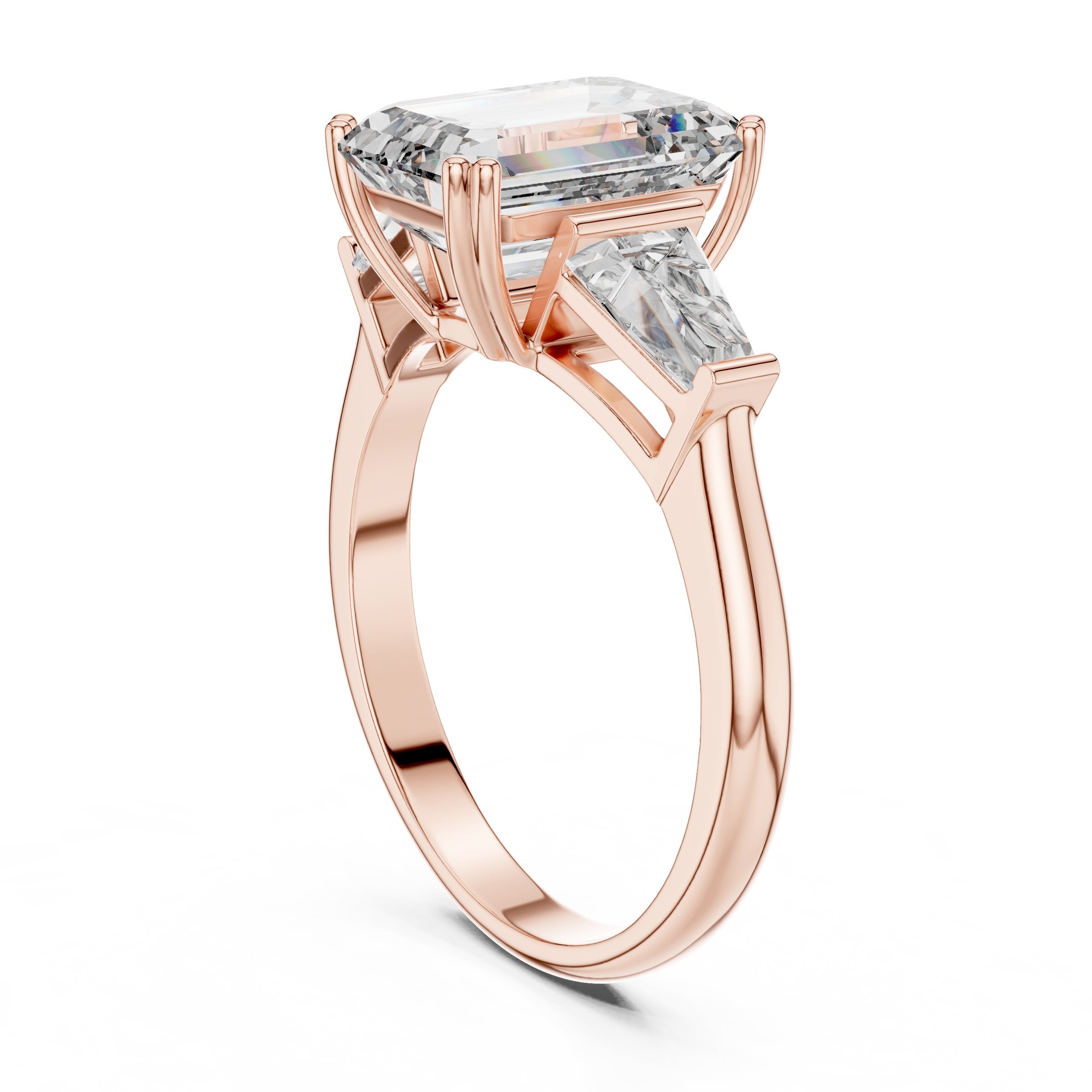 Emerald Cut Three Stone Engagement Ring with Tapered Baguette Sides in Rose Gold - VYKA Diamonds