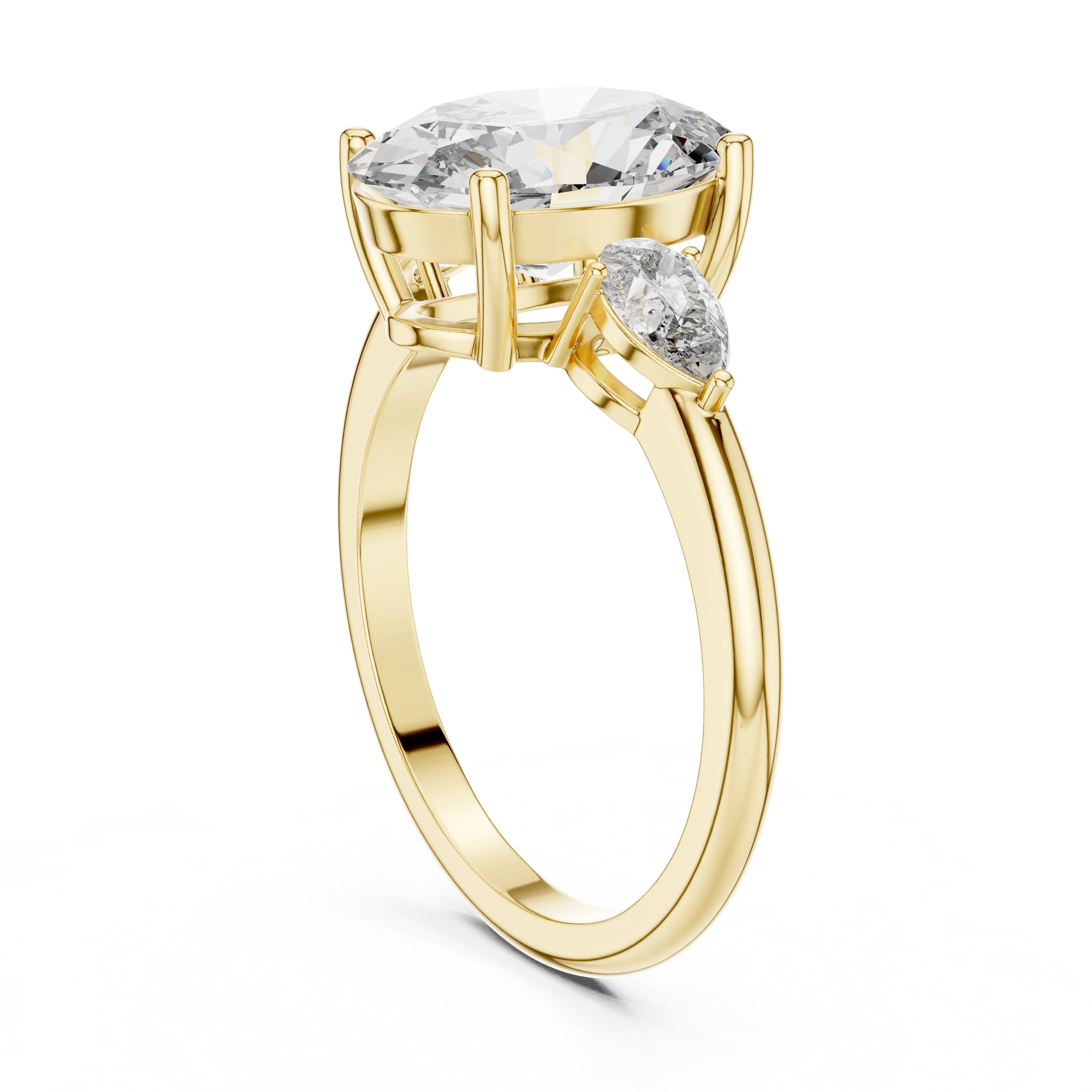 Oval Diamond Three Stone Engagement Ring with Pear Sides in Yellow Gold - VYKA Diamonds